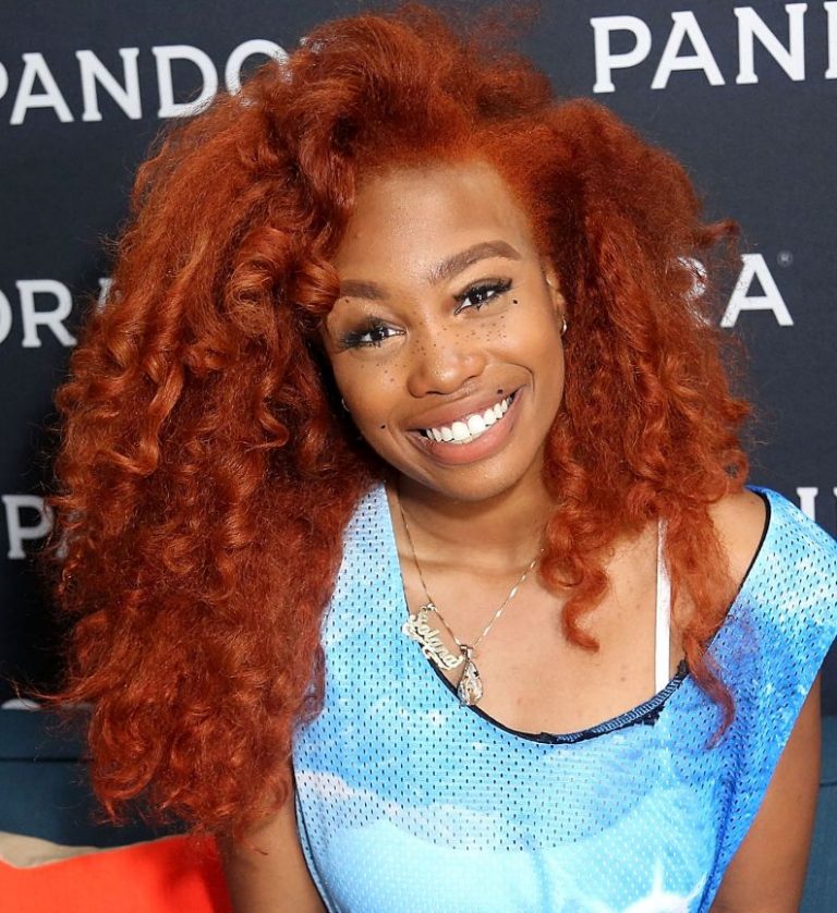 Thanks To SZA The Burnt Orange/Red Is Trending Once Again