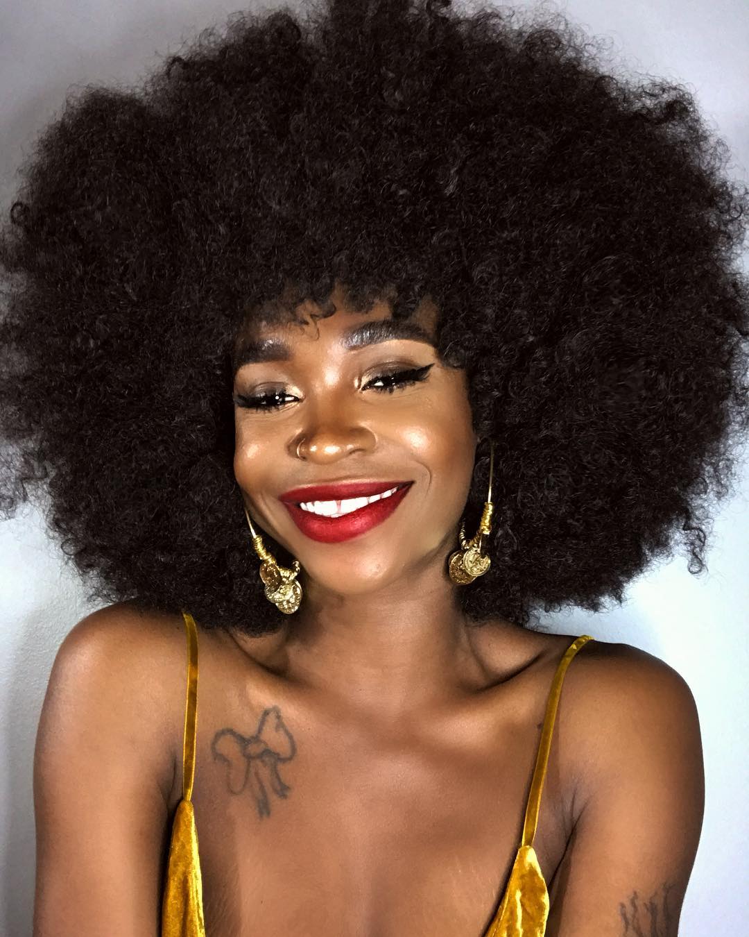 Afro And Red Lipstick
