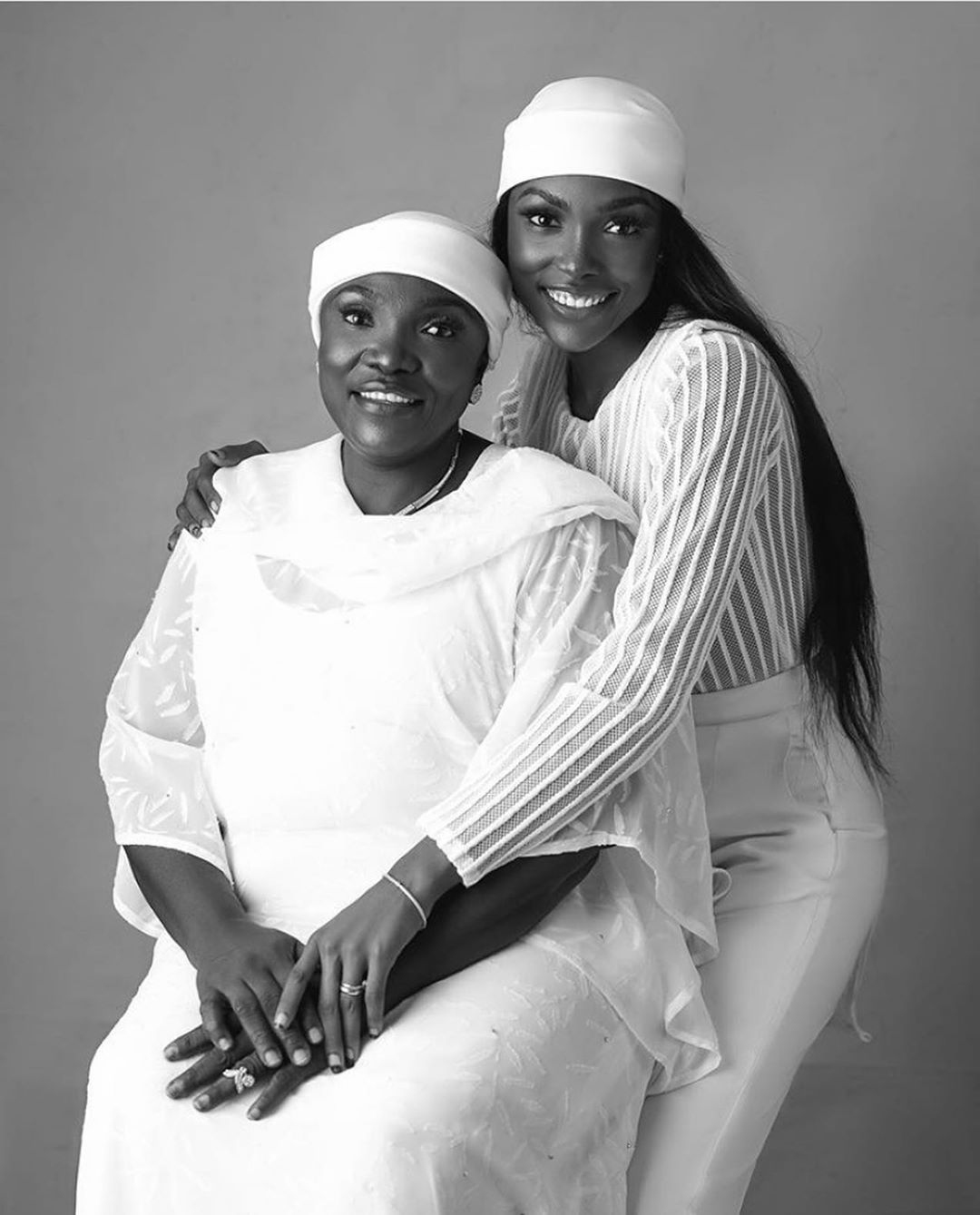 Nanfe twinning in white with her mother