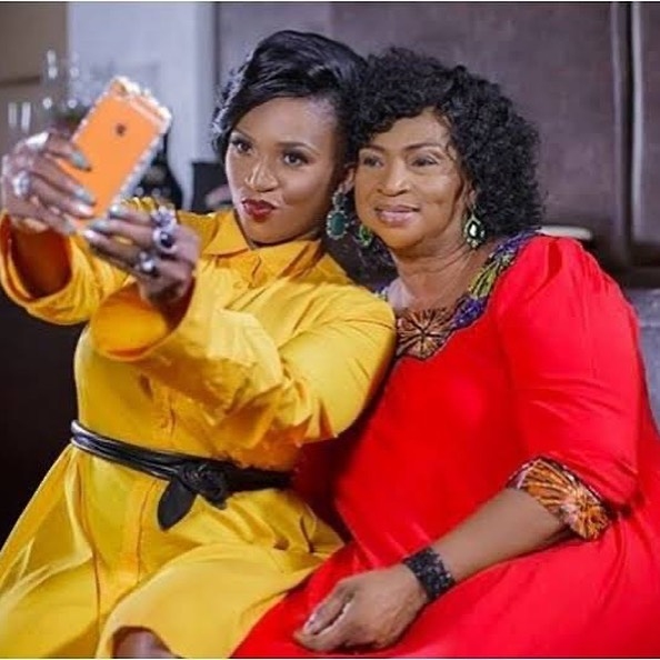 Waje taking a selfie with her mum