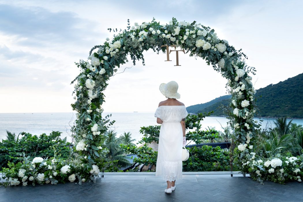 bridal-hat-on-a-woman-by-beach-wedding