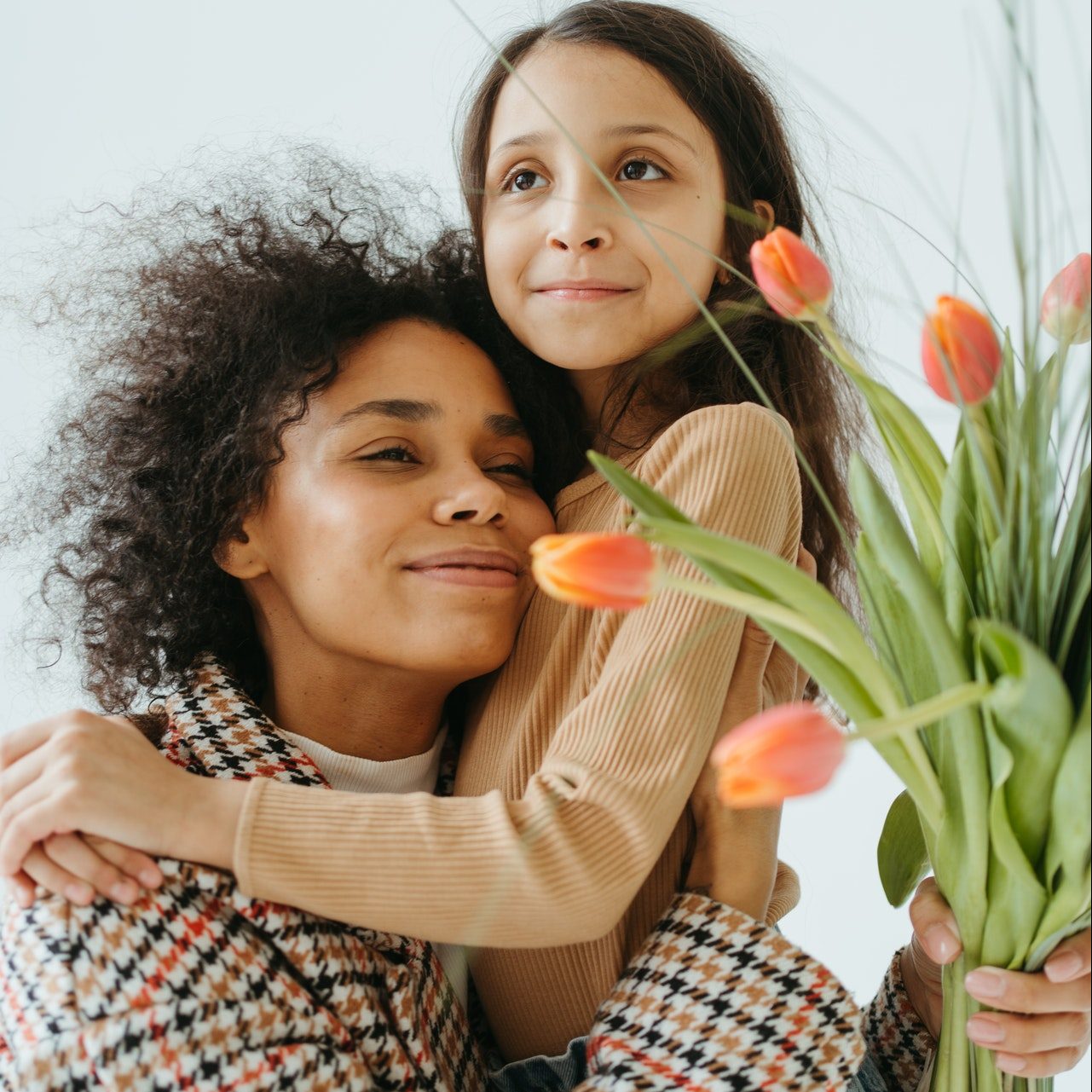 black-woman-hugs-daughter-on-mothers-day