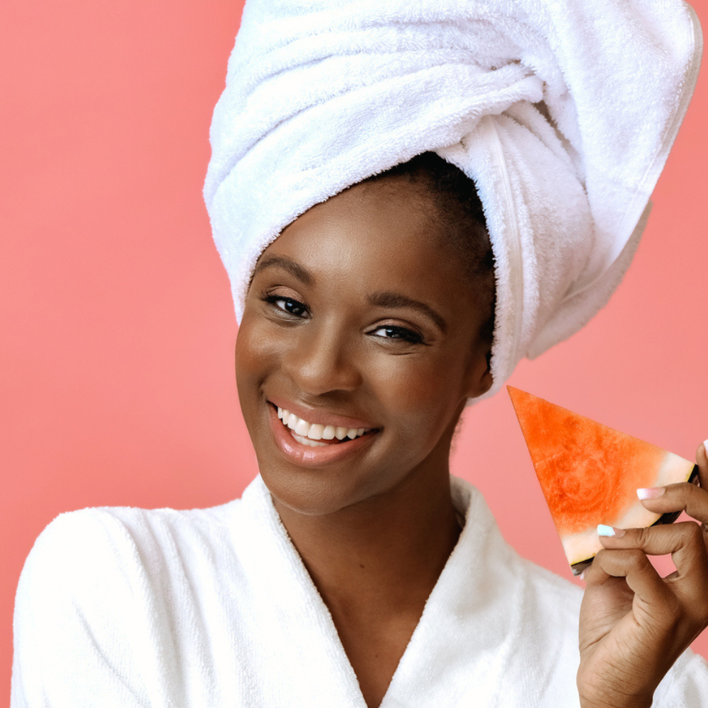 benefits-of-watermelon-for-skin-stle-race-black-girl-smiling-holding-watermelon