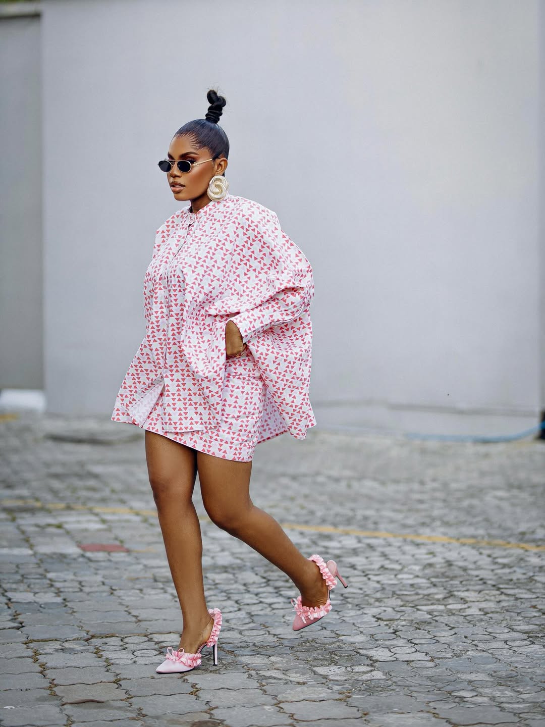 woman wearing a matching two piece for summer capsule wardrobe essential