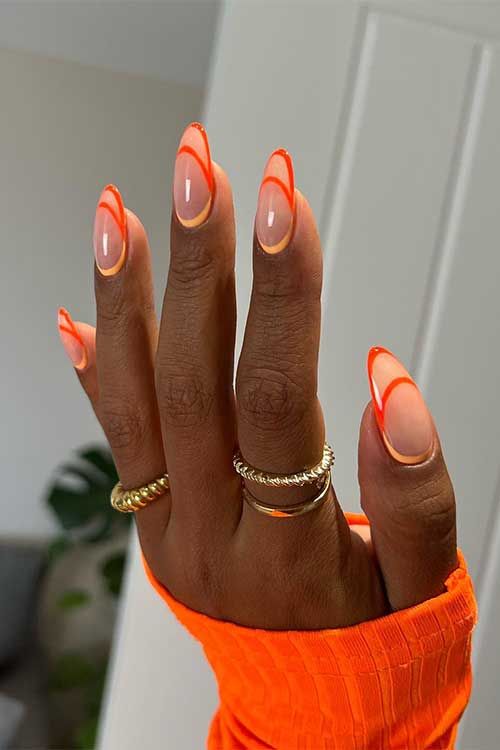 orange negative space nails