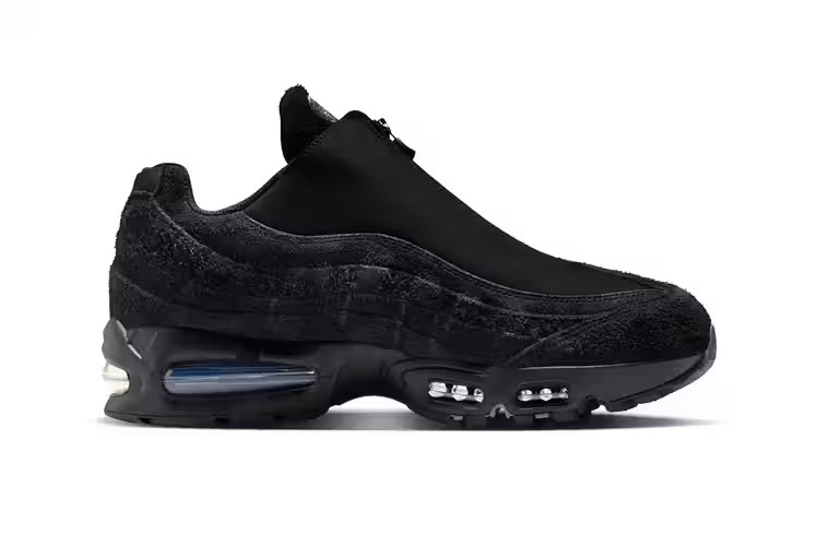 Кроссовки Nike Air Max 95 Zip Black Edition крупным планом, подчеркивающие гладкую и ворсистую замшевую текстуру.