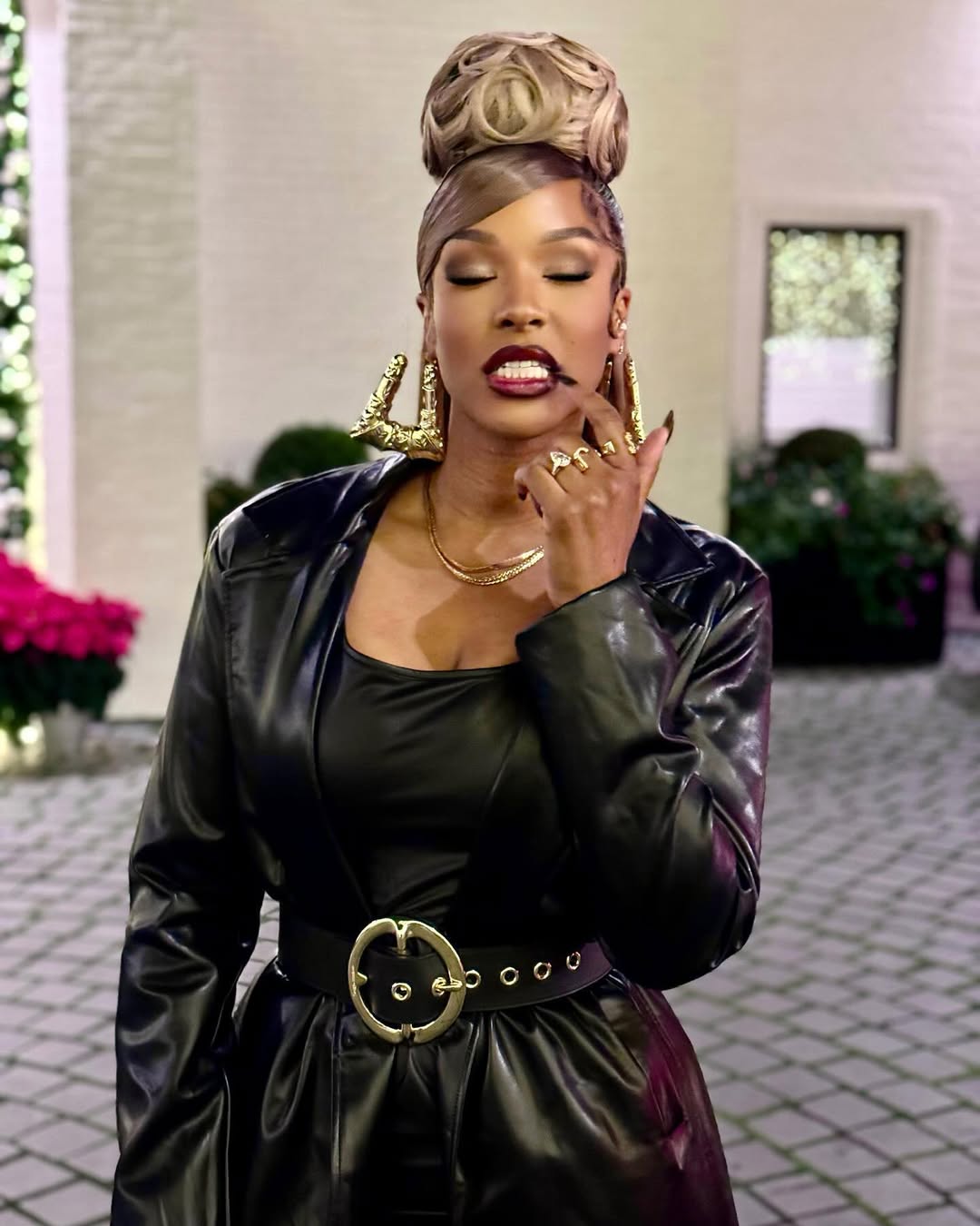 savannah james in a blonde updo hairstyle