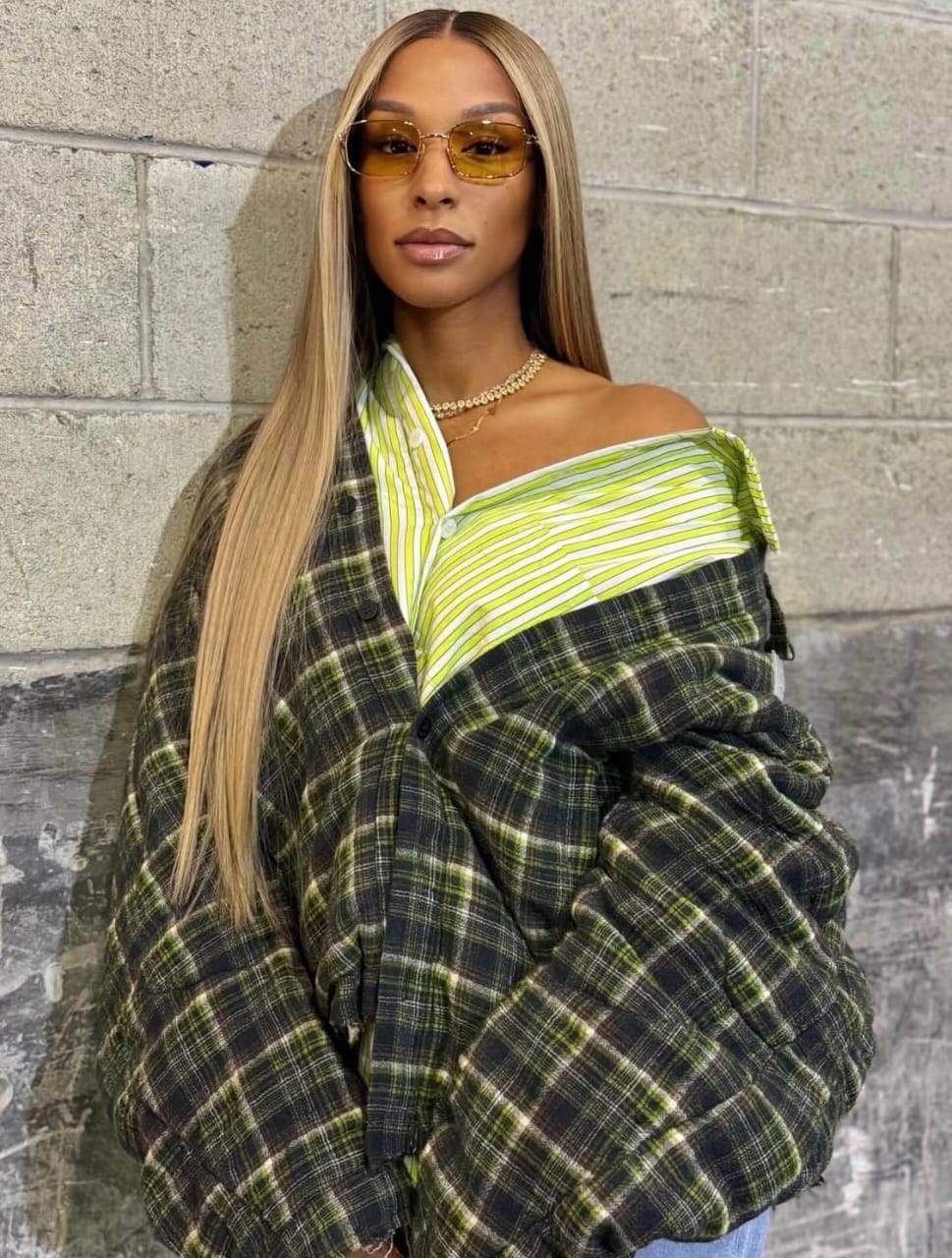 savannah james wears a sleek straight blonde hairstyle