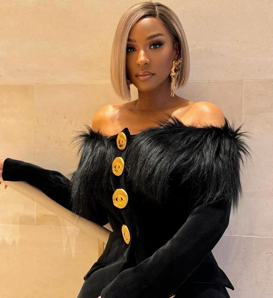 savannah james wears a blonde bob hairstyle