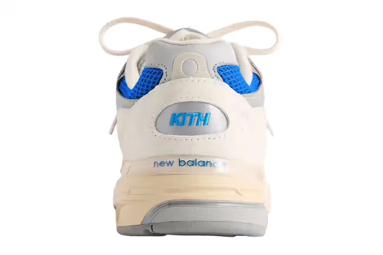 Detail shot of the Kith branding on the heel of the New Balance 993 “Knicks” sneakers.