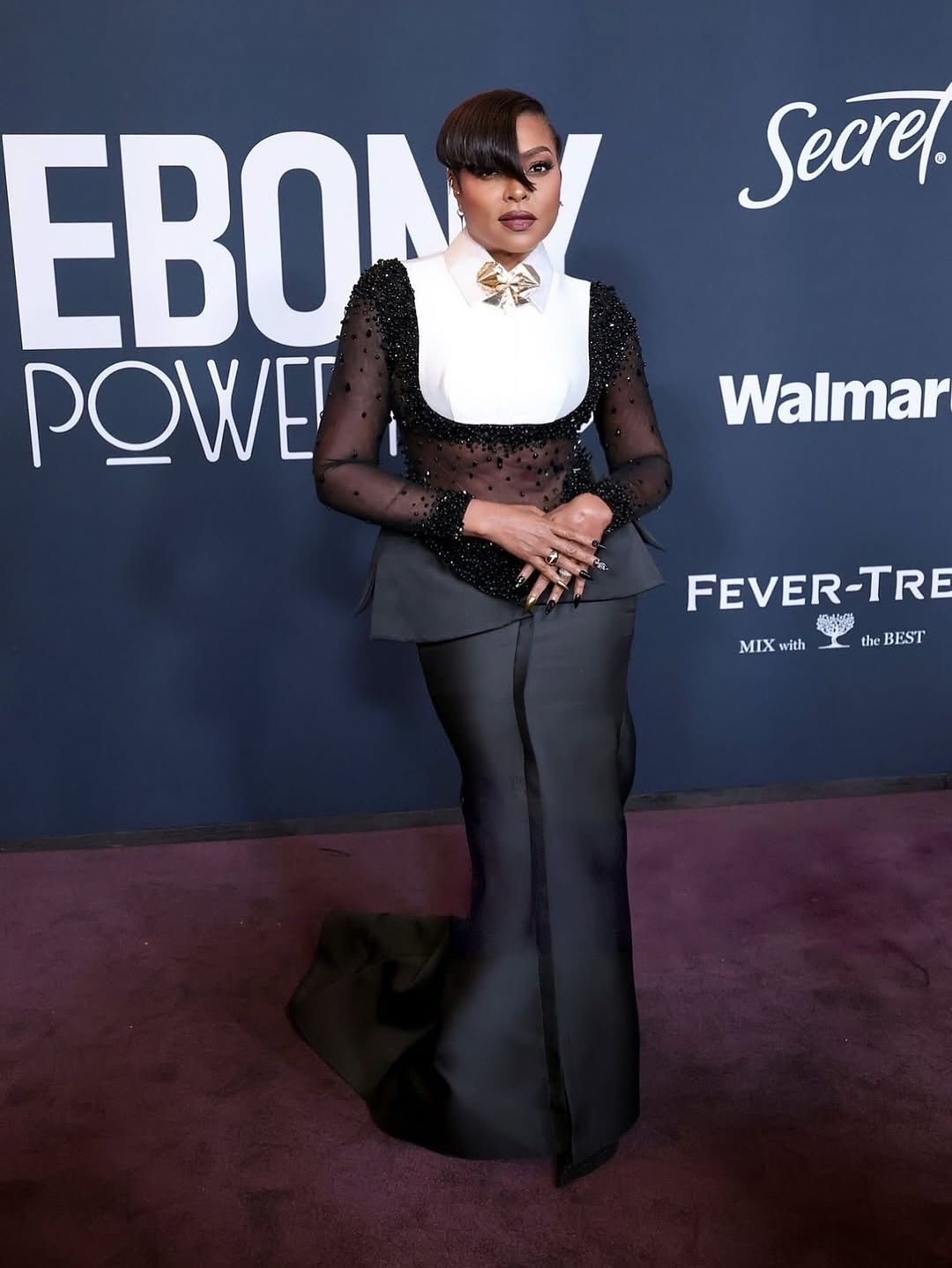 Taraji P. Henson attends the Ebony Power 100 Gala in a striking black-and-white embellished gown by Sebastian Gunawan.