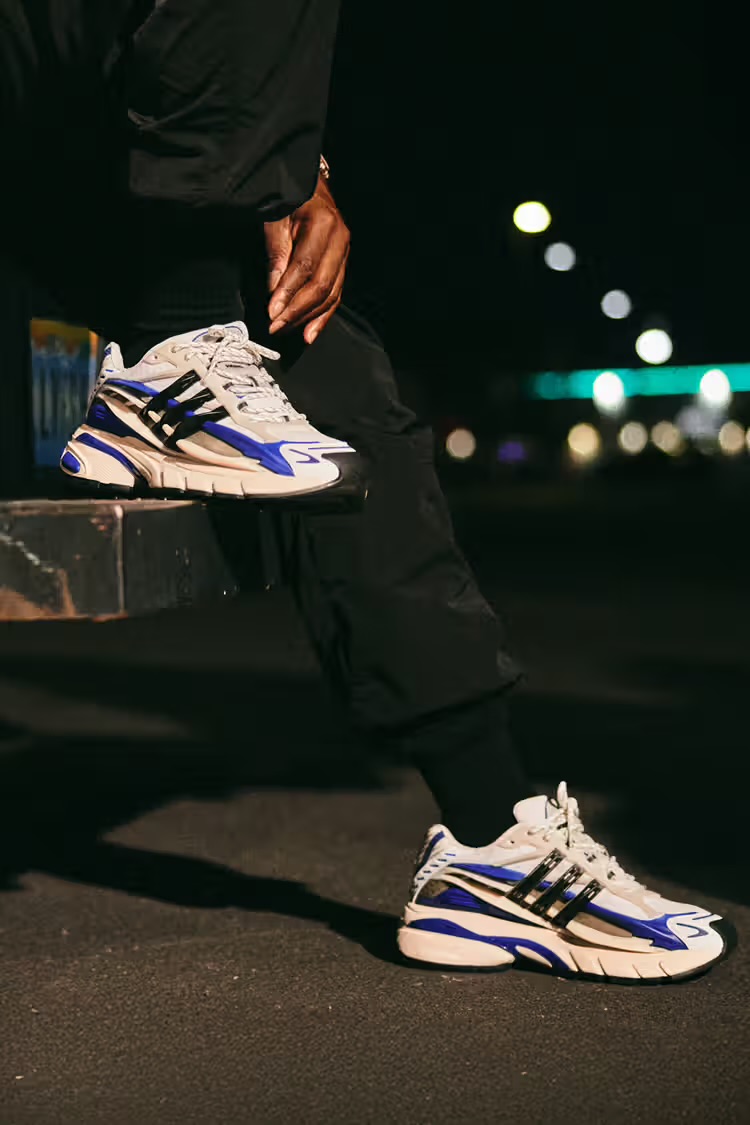 Promotional image highlighting the futuristic glow and fluid silhouette of Pharrell’s Adidas Jellyfish sneaker