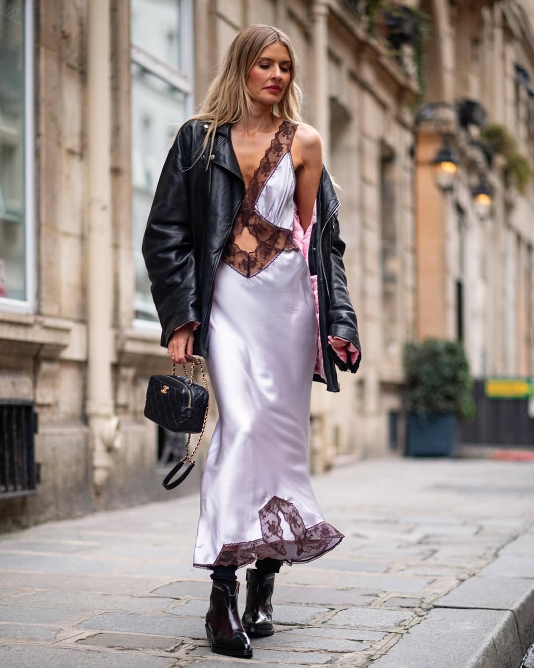 woman wearing lingerie as clothes dress with leather jacket