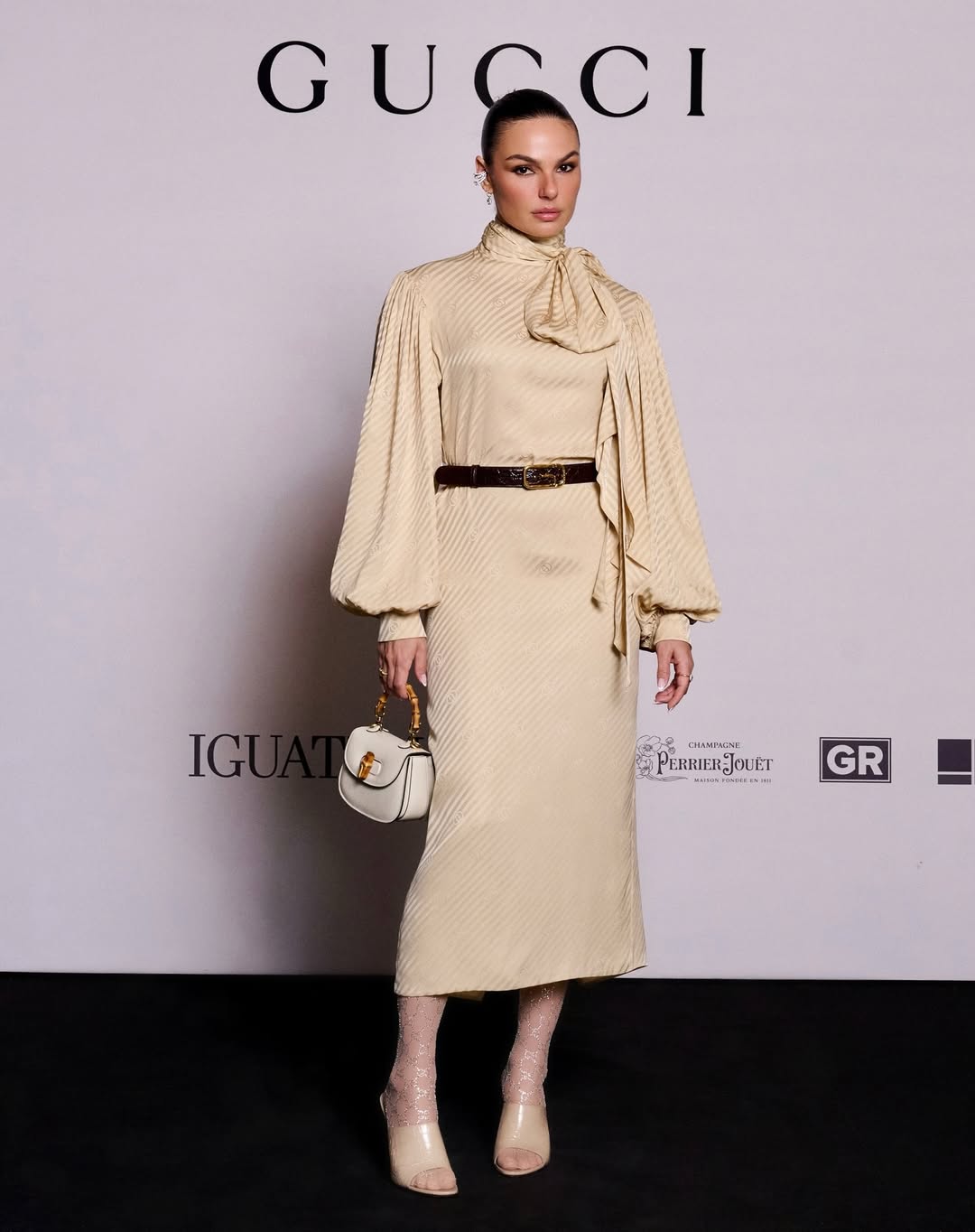 woman wearing a midi dress outfit for thanksgiving ideas