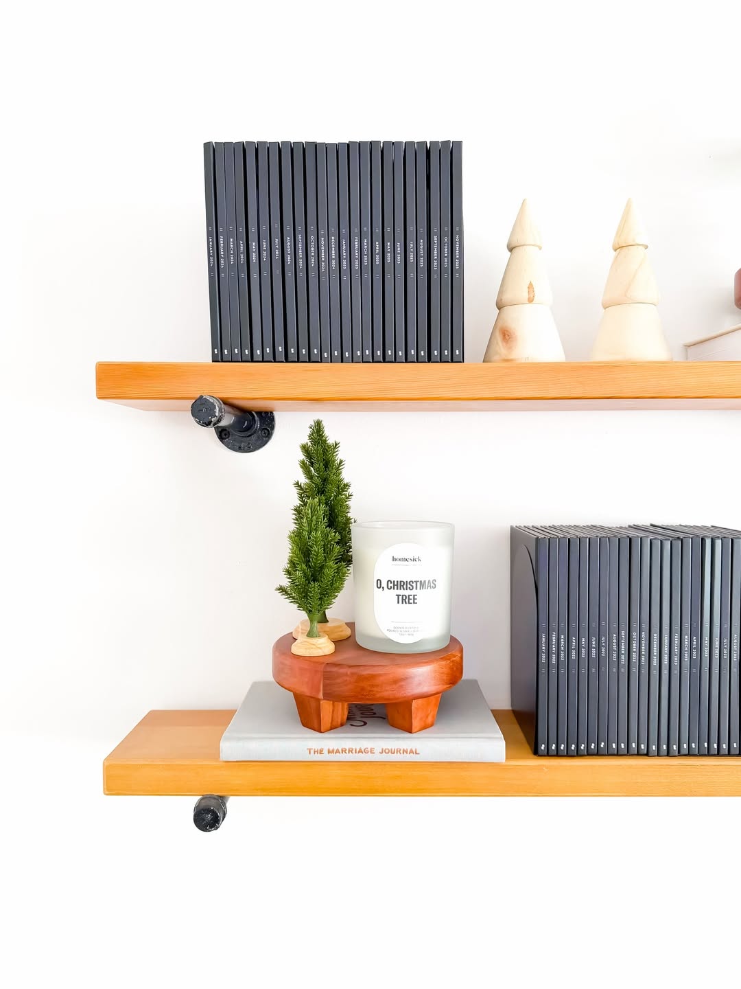 Scented candles and cozy Christmas gifts from top Christmas Shopify stores.