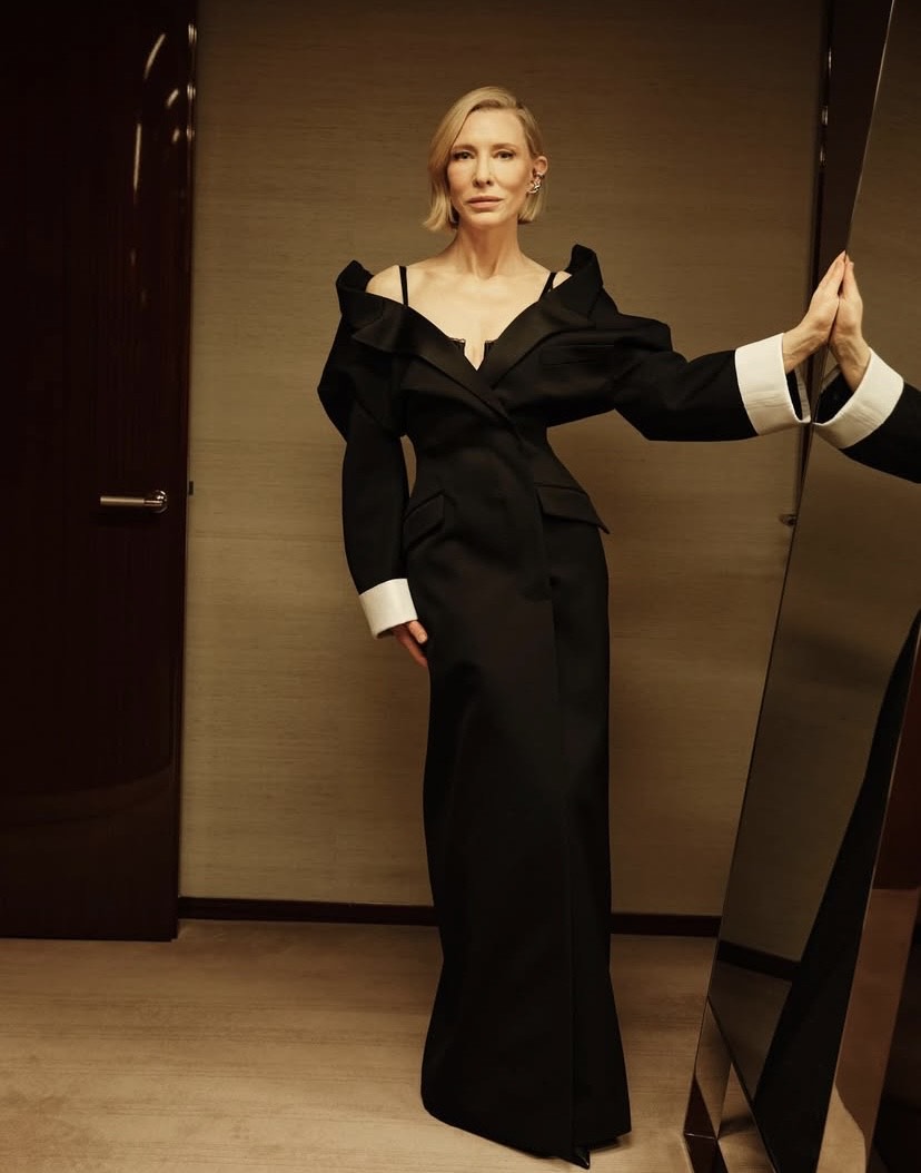 Cate Blanchett wearing a Givenchy sliced tailored dress with structured shoulders and white cuffs, a standout contender for the Fashion Awards 2025 best look.