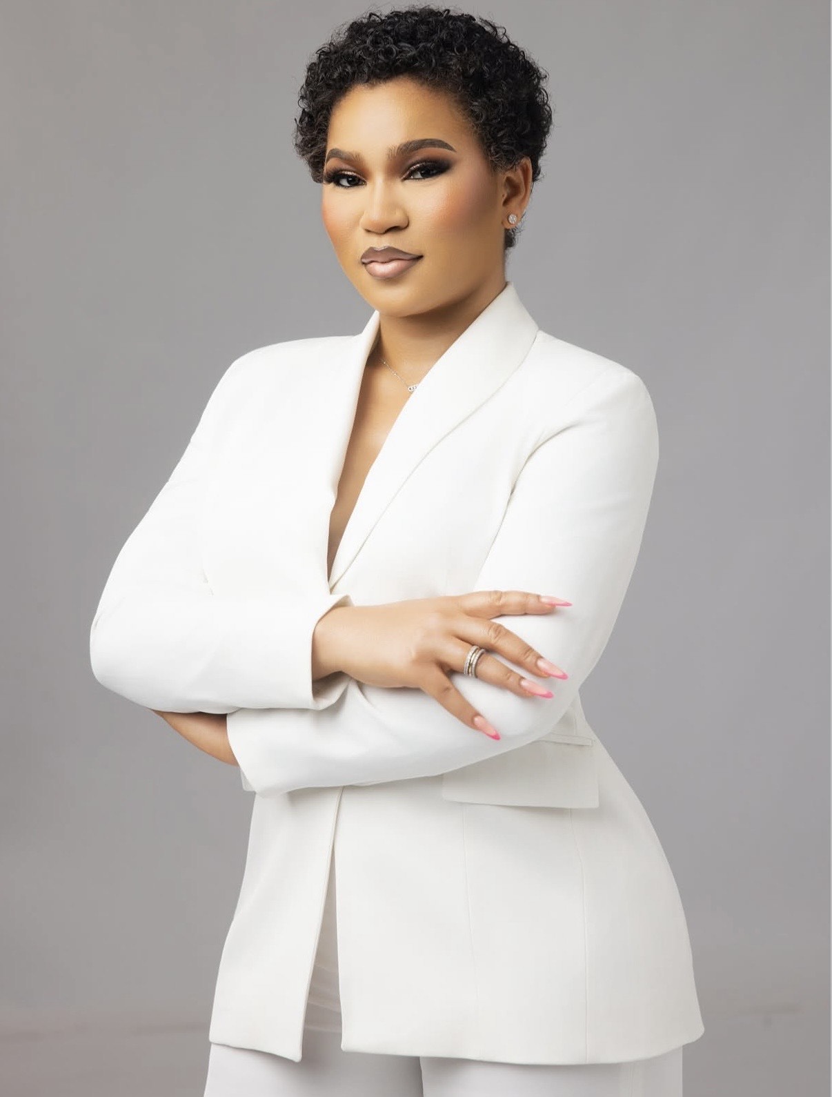 Defined TWA curls styled as short natural hairstyles for Christmas