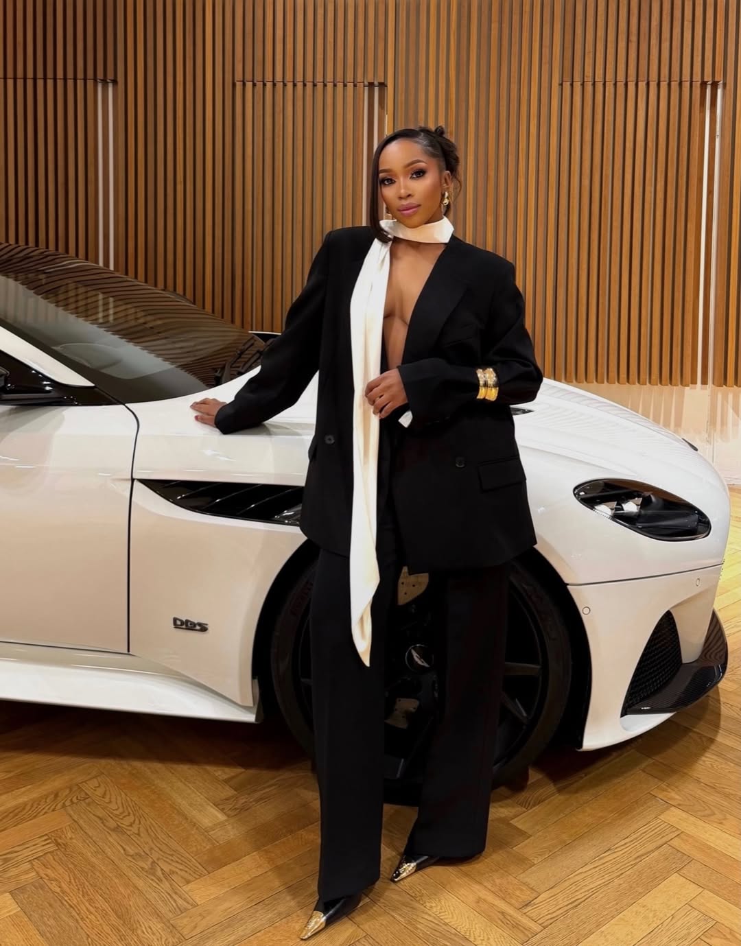 woman wearing black suit for holiday festive outfits