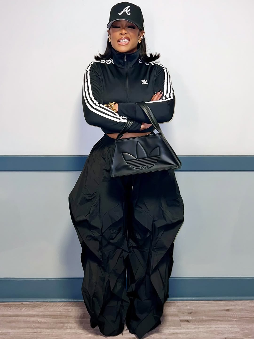 woman wearing sporty outfit to a holiday music festival