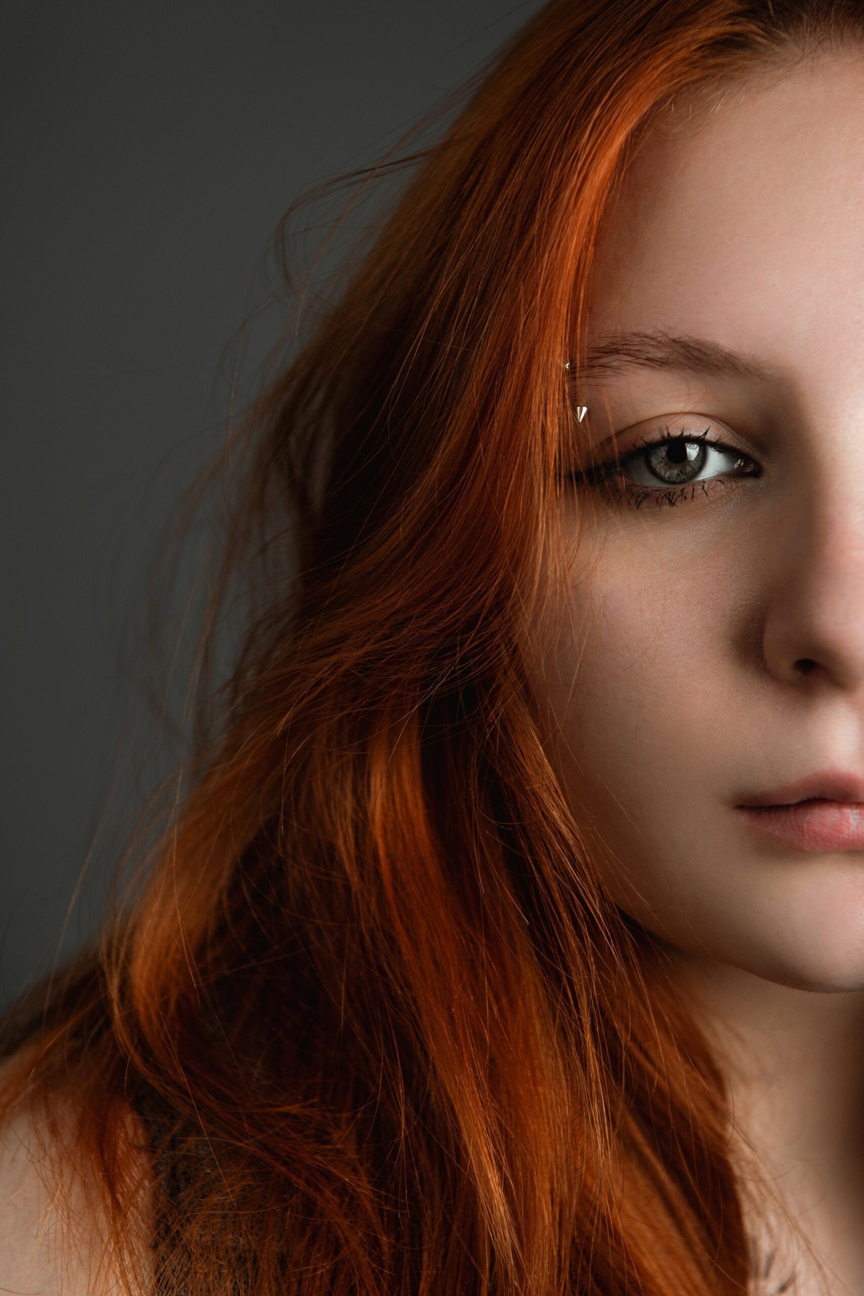 woman with eyebrow piercing