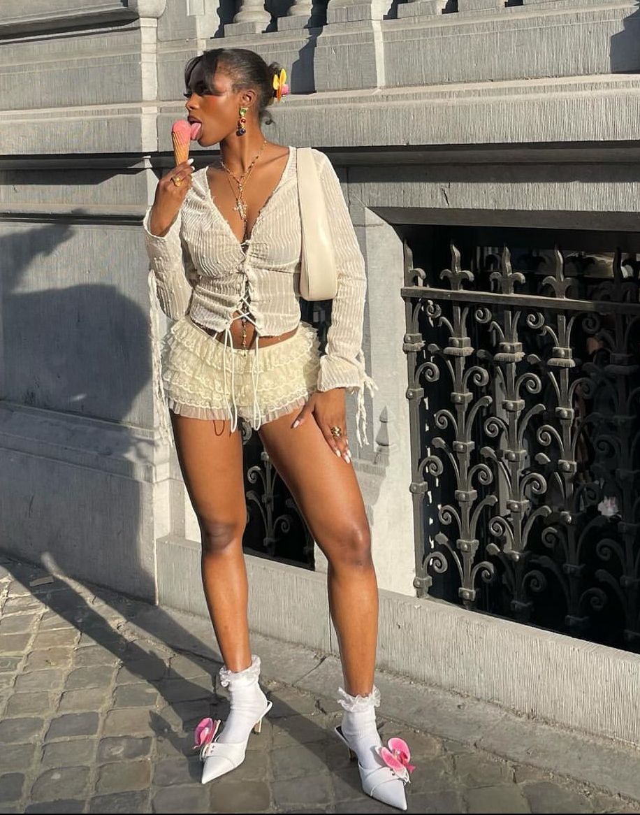 Modern bloomer shorts outfit paired with cropped knit top