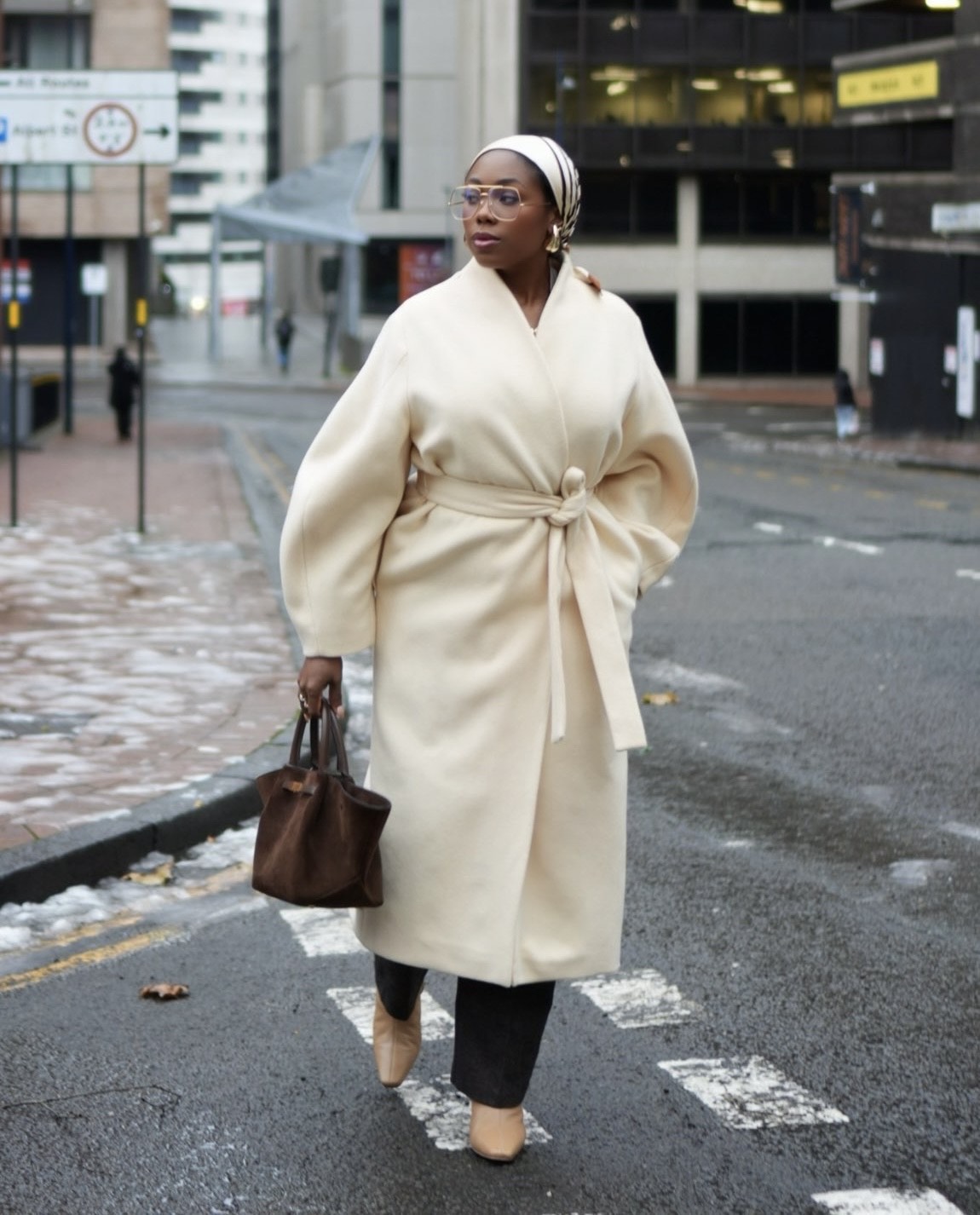 Fashion-forward winter layering outfit for women in cold weather