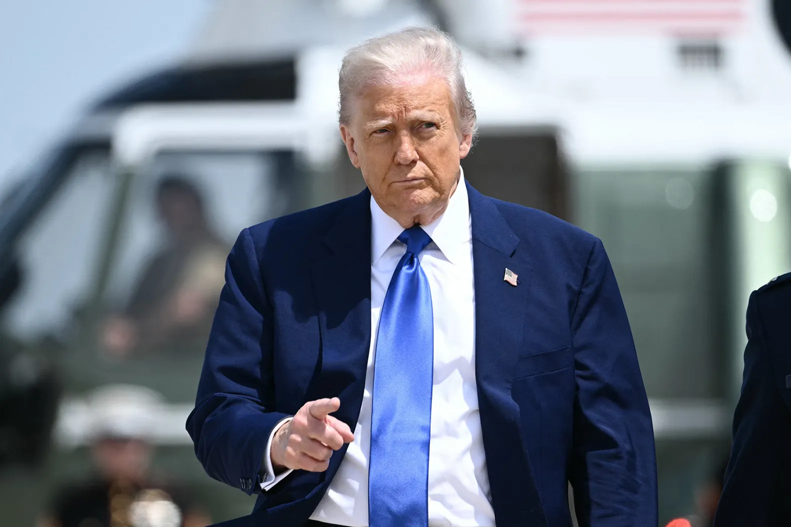 President Donald Trump walks to Air Force One on May 12.