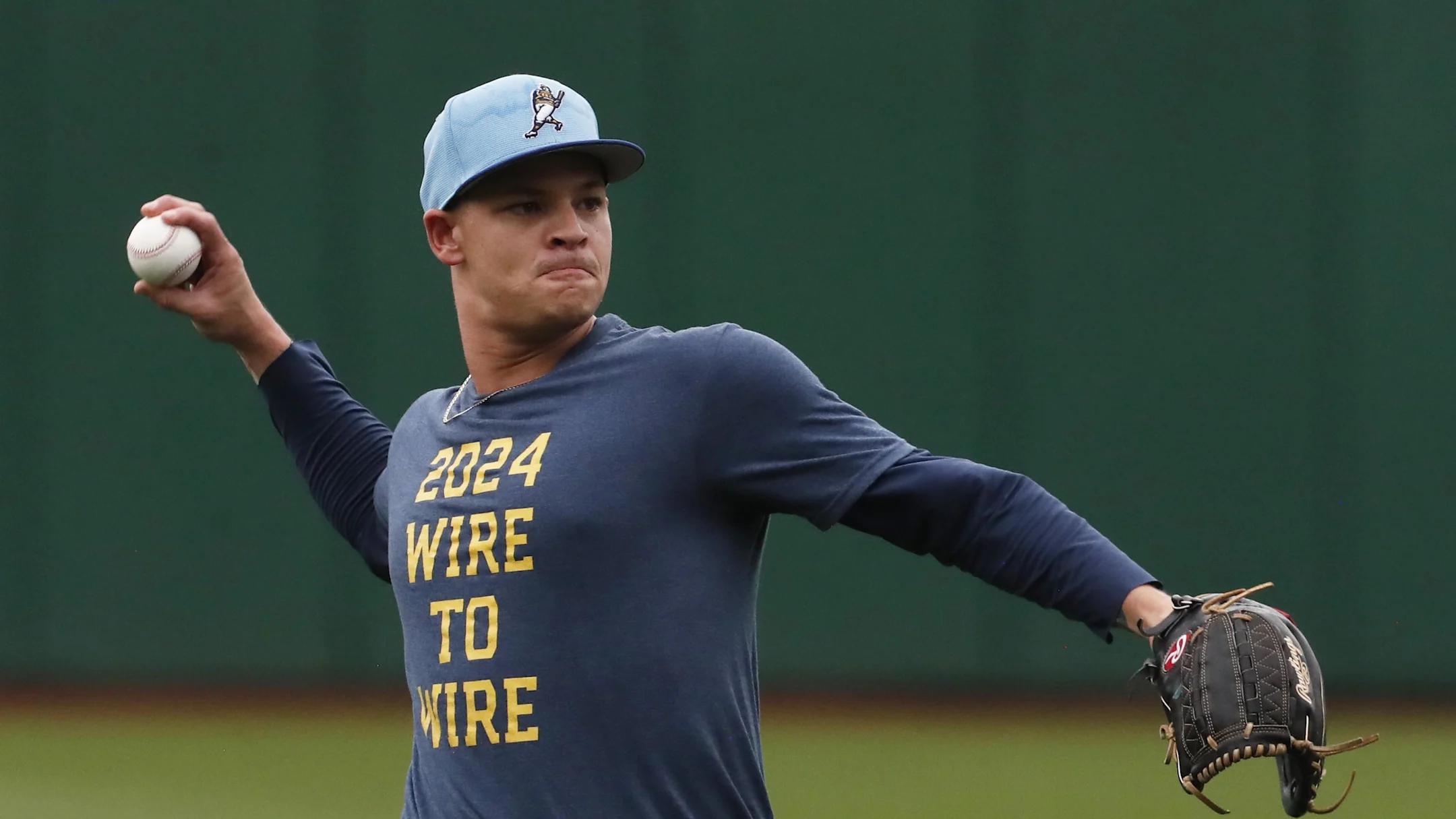Milwaukee Brewers pitcher Tobias Myers (36) warms up in the outfield before a game against the Pittsburgh Pirates at PNC Park in 2024.