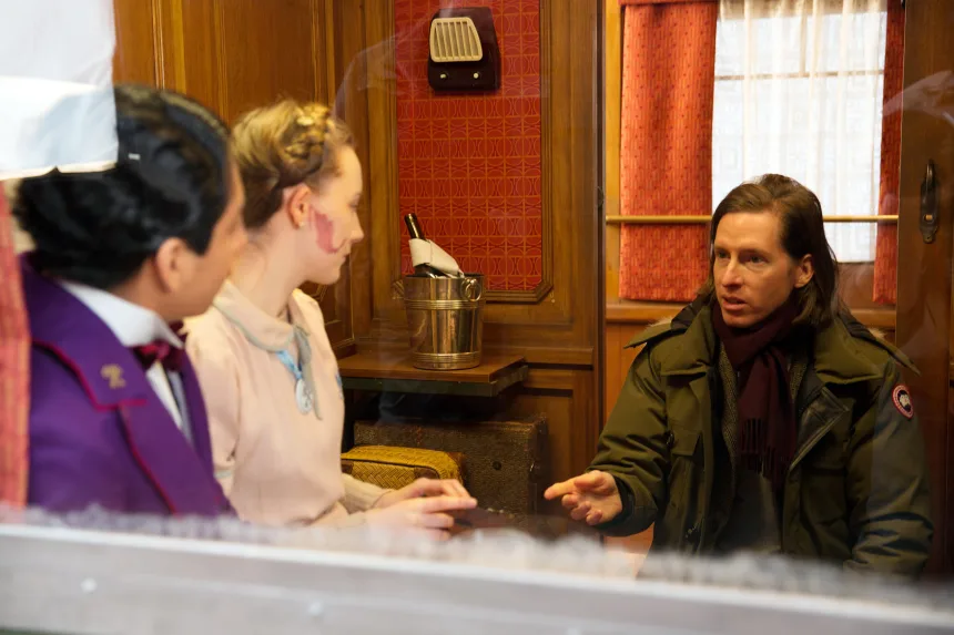 Tony Revolori, Saoirse Ronan and director Wes Anderson on the set of 2014's "The Grand Budapest Hotel."