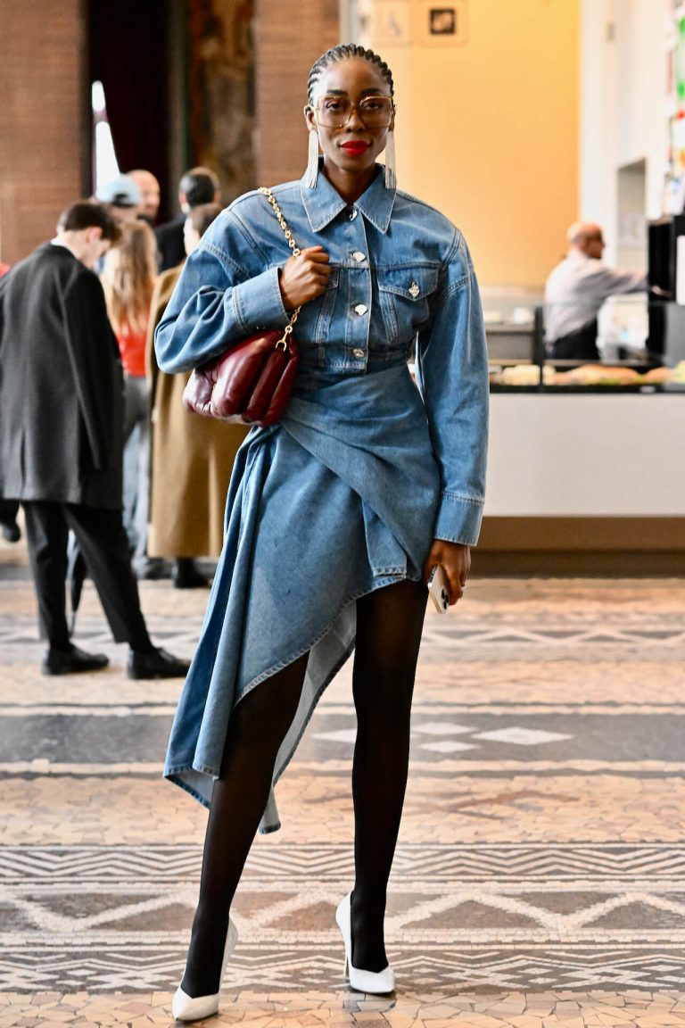Asymmetrical denim top paired with straight jeans for a modern denim on denim 2026 trend