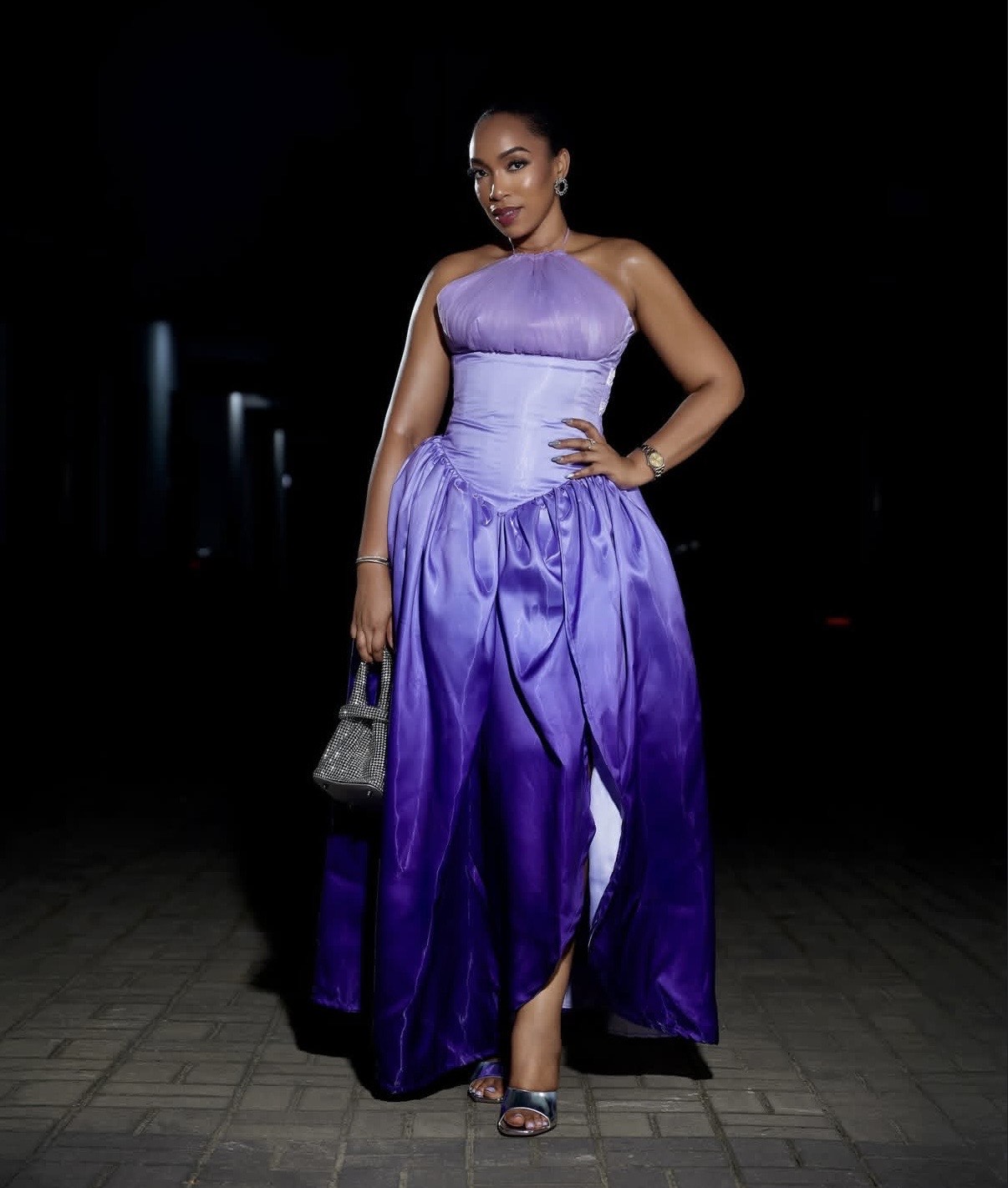Eki Ogunbor in lavender to purple Aso Nigeria halter dress at the movie premiere of Everything Is New Again