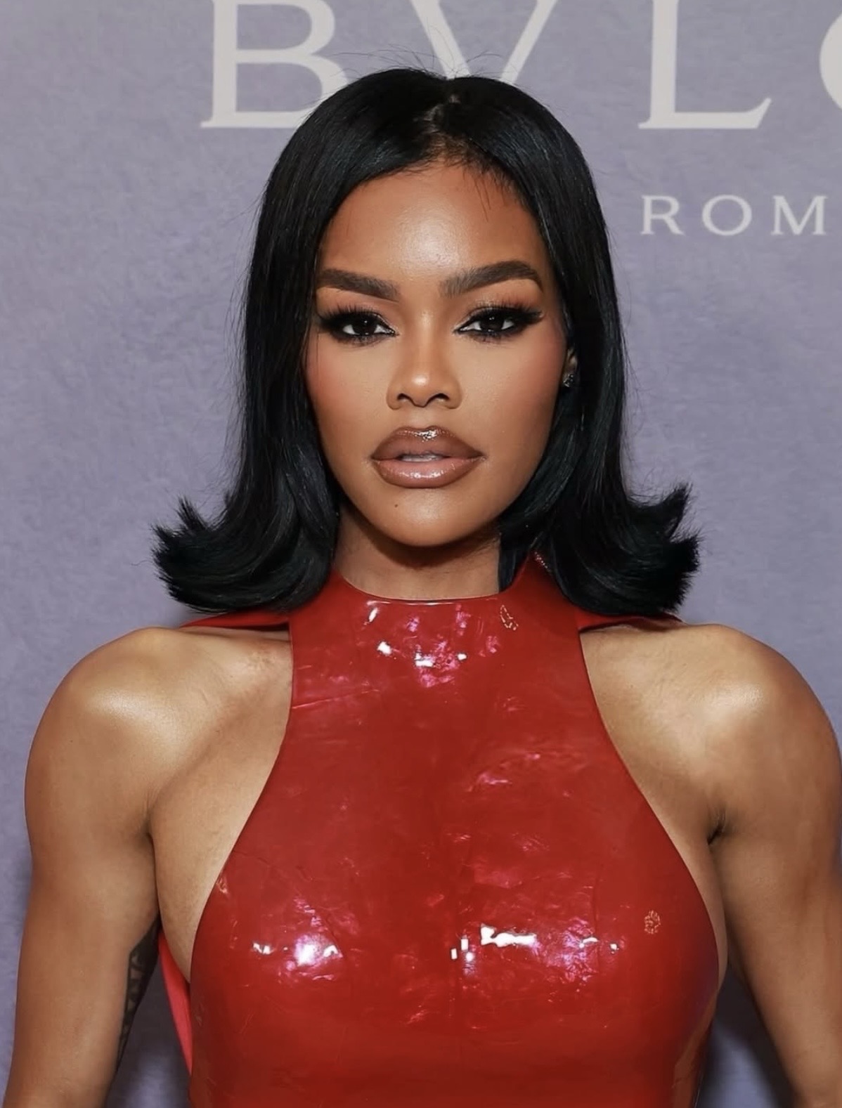 Teyana Taylor's retro-inspired glam beauty hair flip with blunt shoulder-length bob