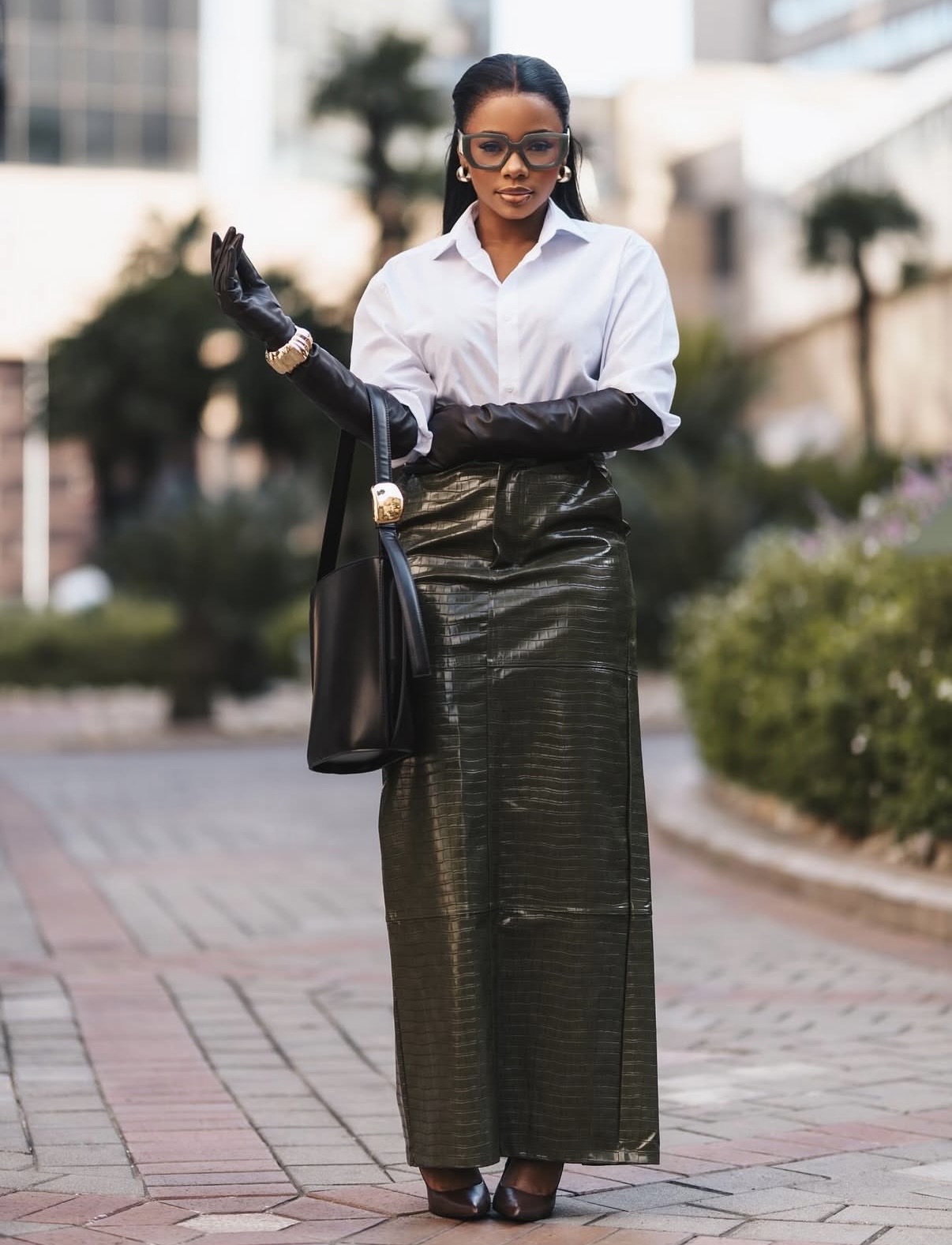 Maxi leather pencil skirt paired with white shirt—maxi pencil skirt outfit ideas