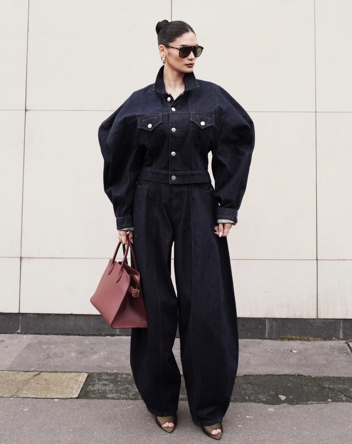 Structured denim shirt styled with barrel jeans silhouette — denim on denim 2026 trend