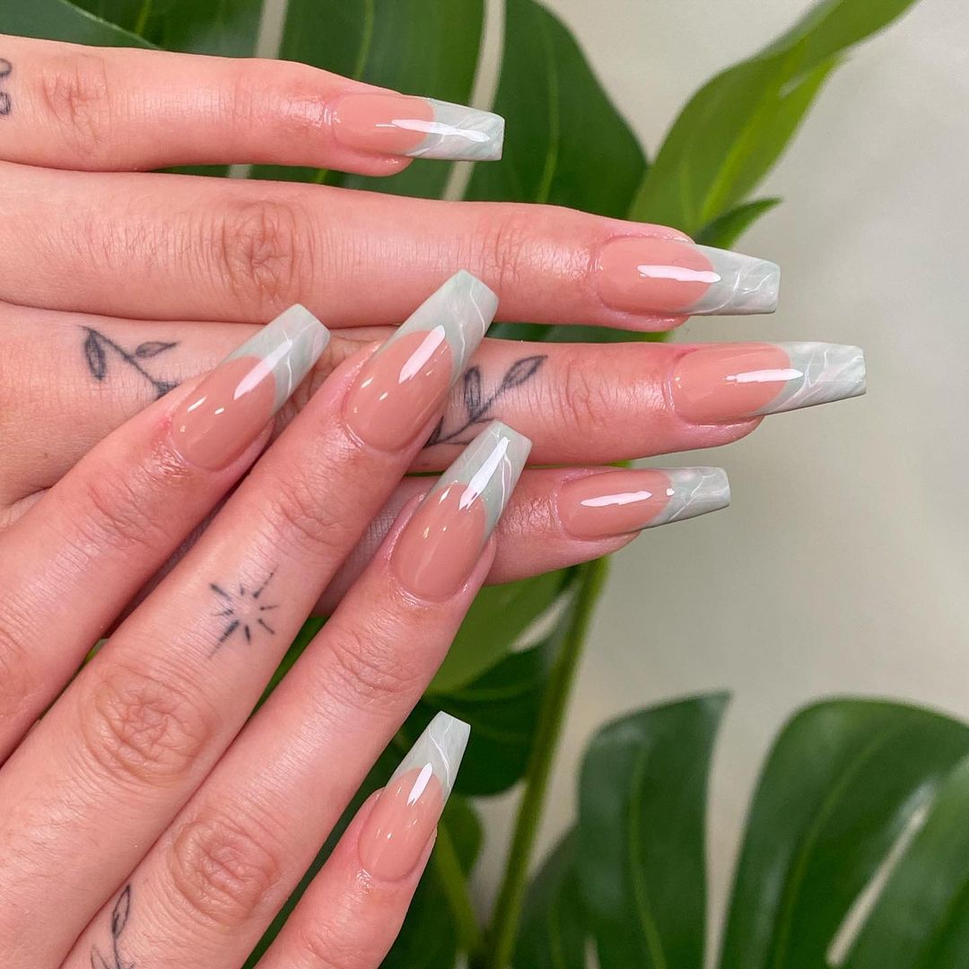 Coffin-shaped nails with sage green and white marble French tips— sage green nails for spring