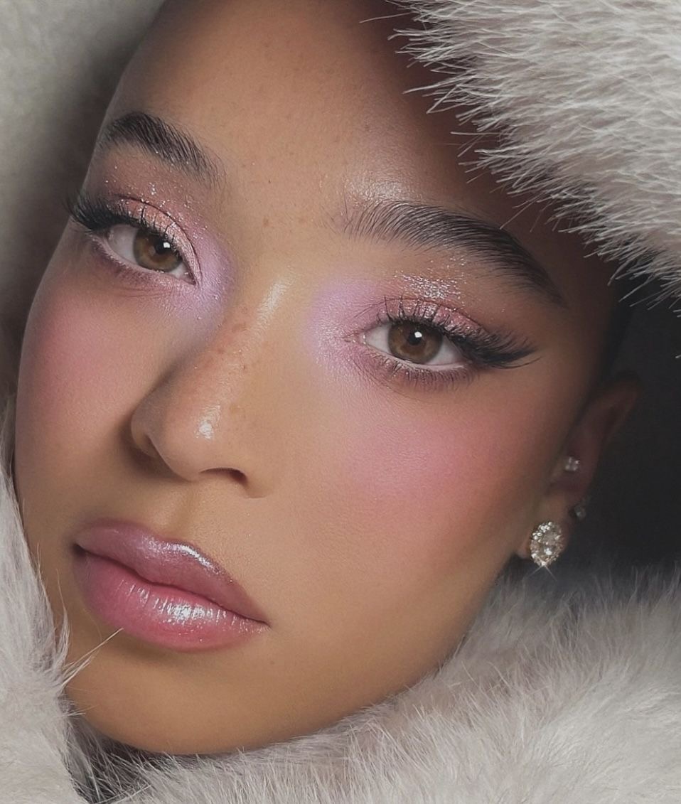 Pink and lilac blush-focused pastel makeup look with dewy skin