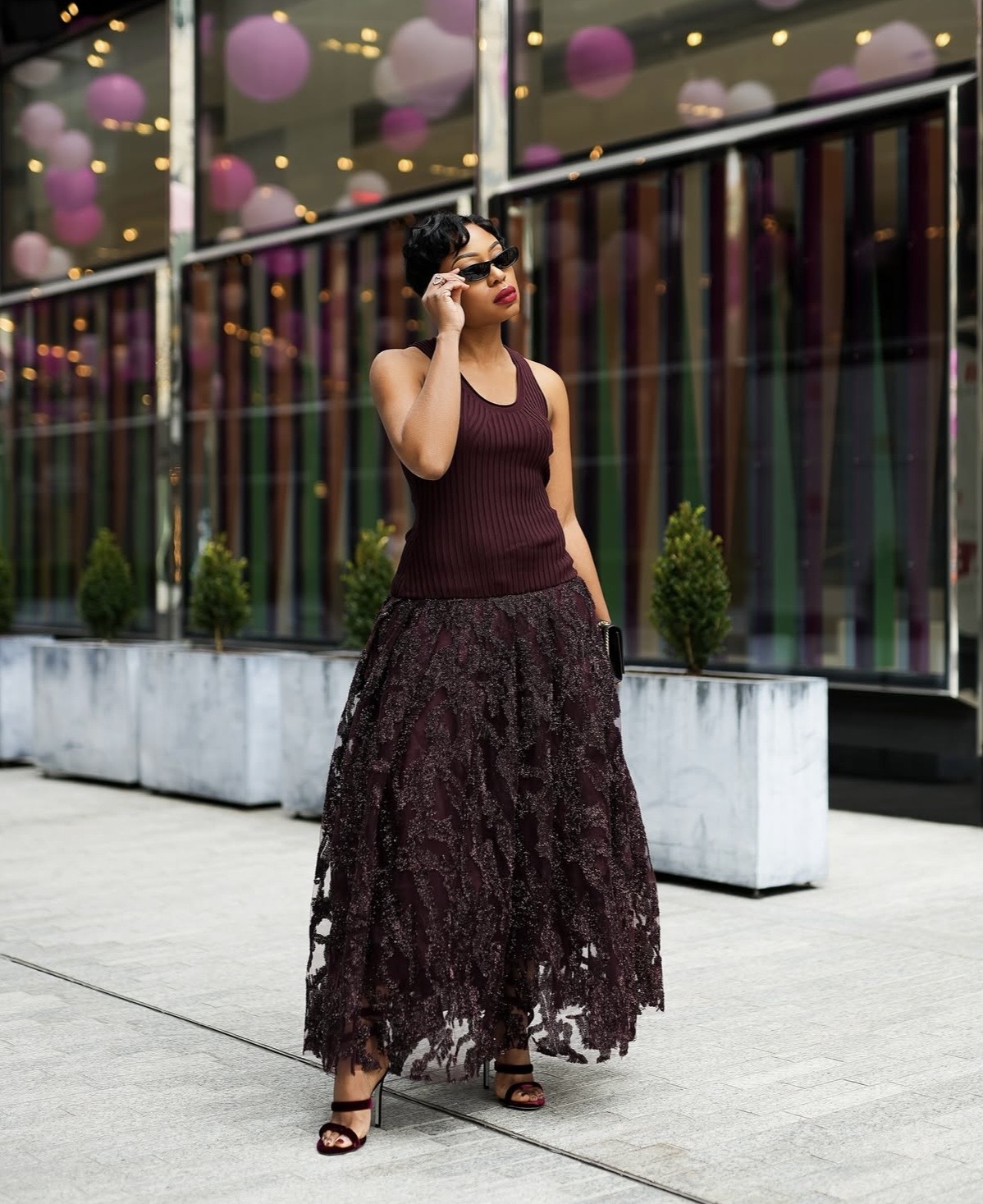 Berry sleeveless top styled with tiered lace A-line maxi skirt outfit— A-line maxi skirt styling tips