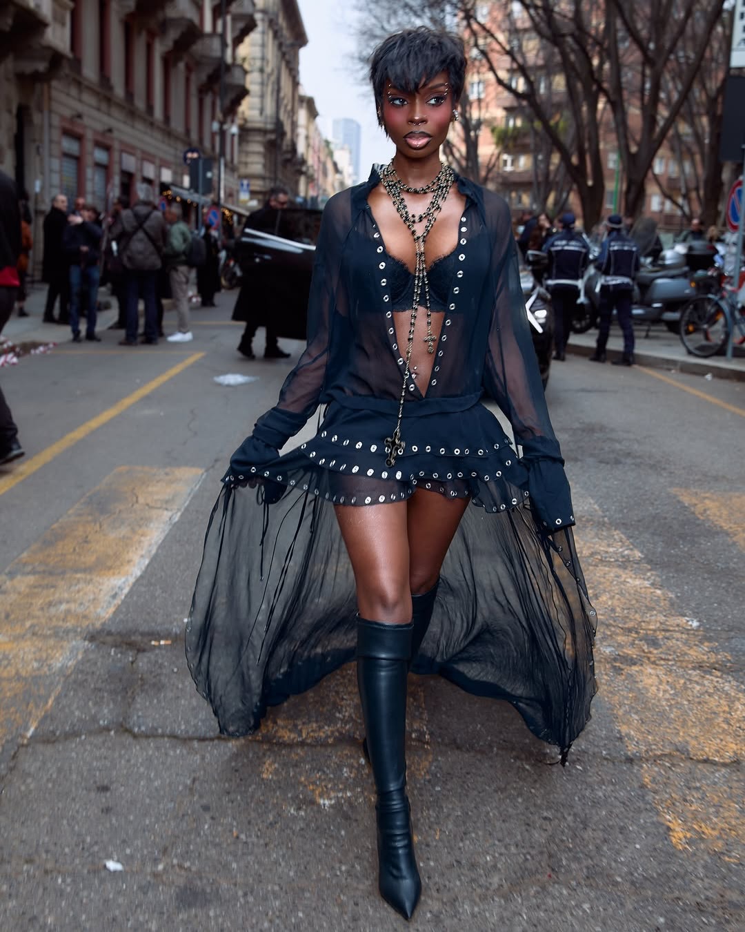 Olandria in Blumarine FW27 styled by The Reismans, wearing a sheer black ensemble with dramatic detailing and high-fashion edge.