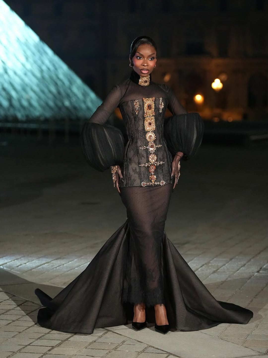 Olandria Carthen attending a fashion dinner event during Paris Fashion Week at the Louvre.