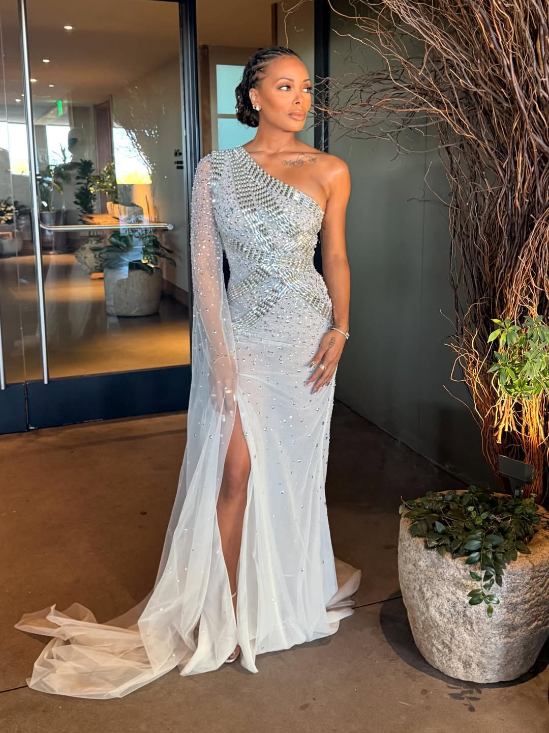 Eva Marcille posing for a stylish portrait shared via Instagram.