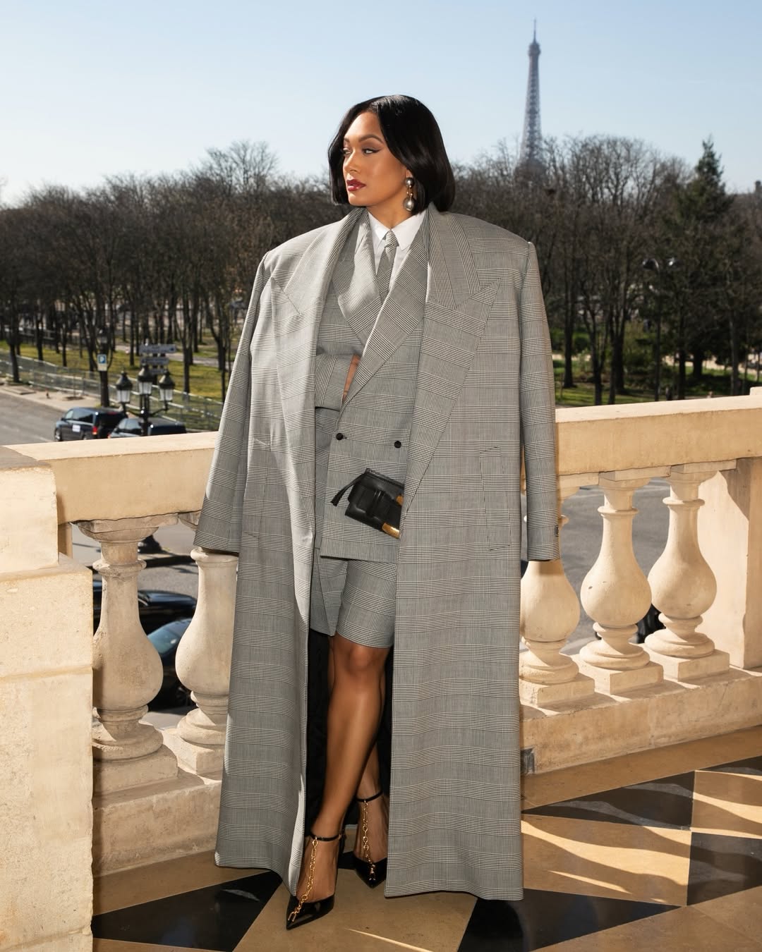 Crystal Renee attending the Balmain Fall/Winter 2026 presentation in a bold fashion look.