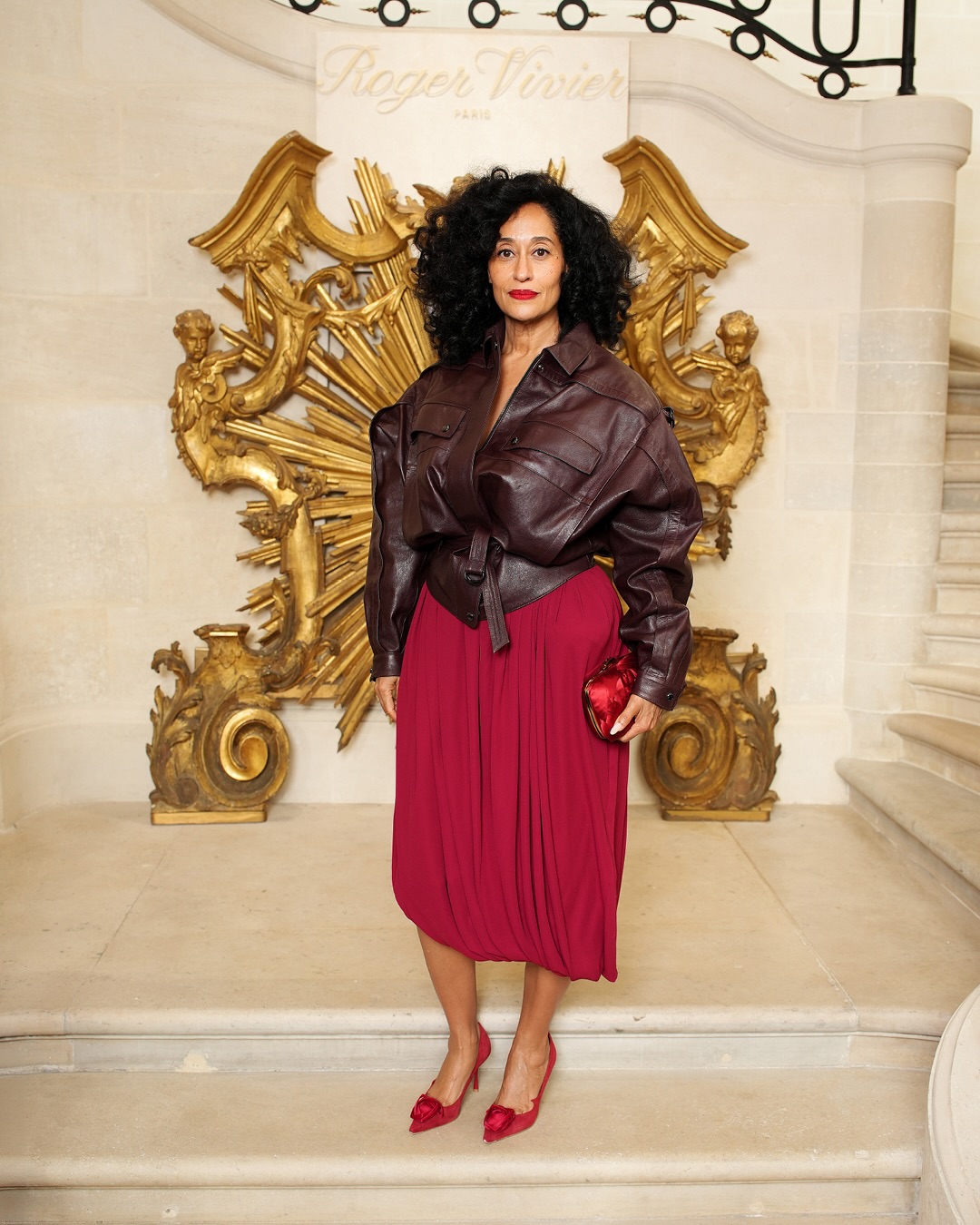 Tracee Ellis Ross attending the Roger Vivier presentation during Paris Fashion Week in an elegant statement outfit.