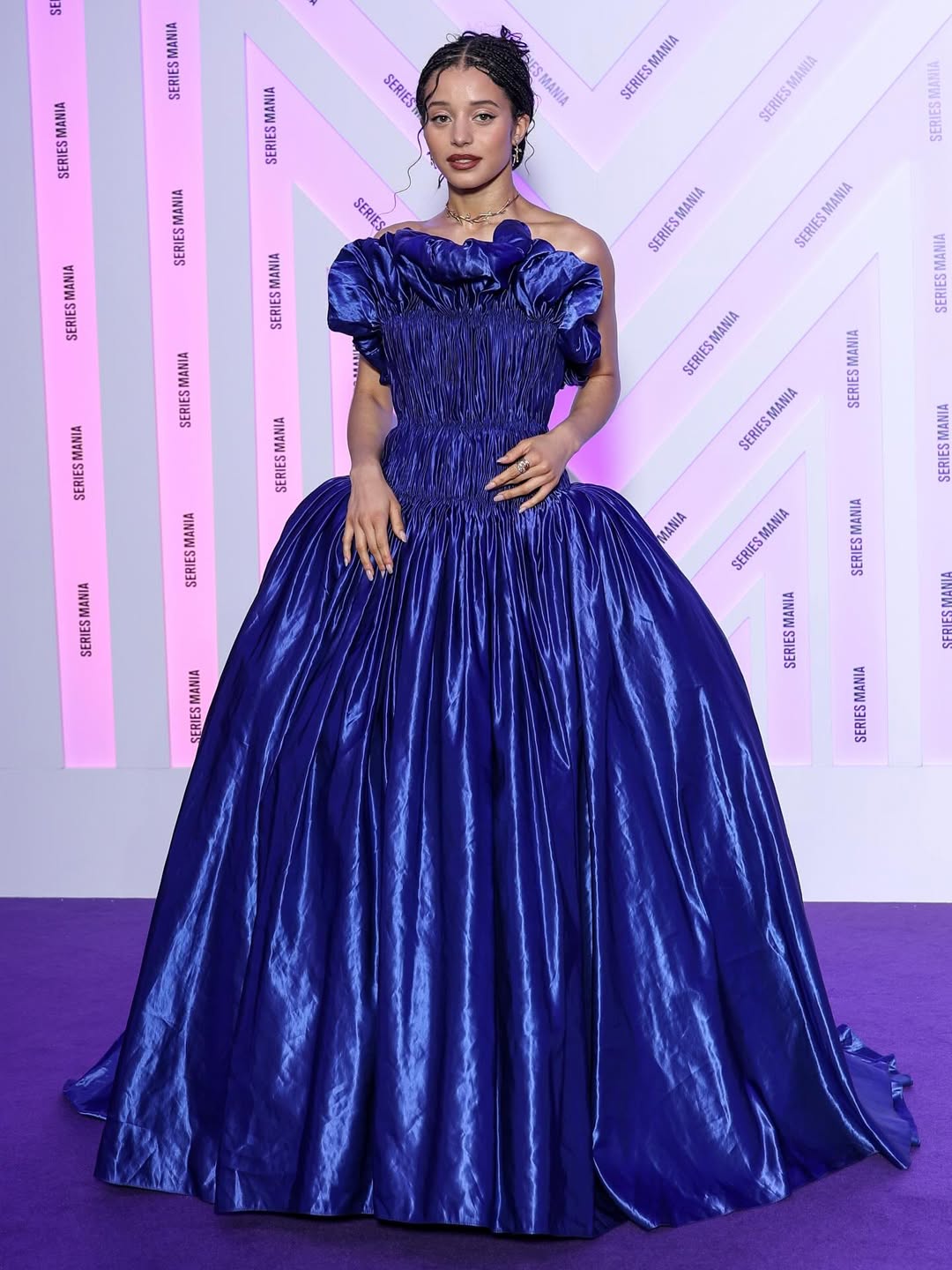 Chase Infiniti wearing a custom blue satin Louis Vuitton gown at the Series Mania Festival opening ceremony in Lille, France.