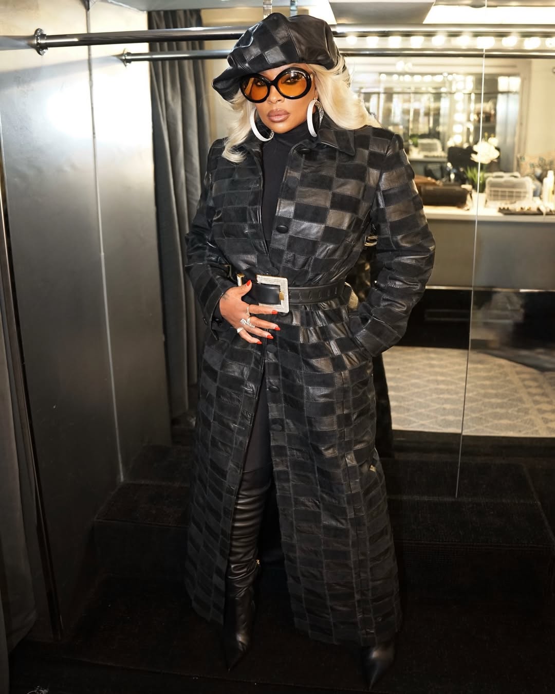 Mary J. Blige wearing a custom Theophilio patchwork leather and suede coat 