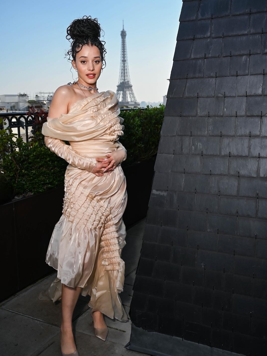 Chase Infiniti Schiaparelli FW26 look The Testaments Paris photocall fashion moment