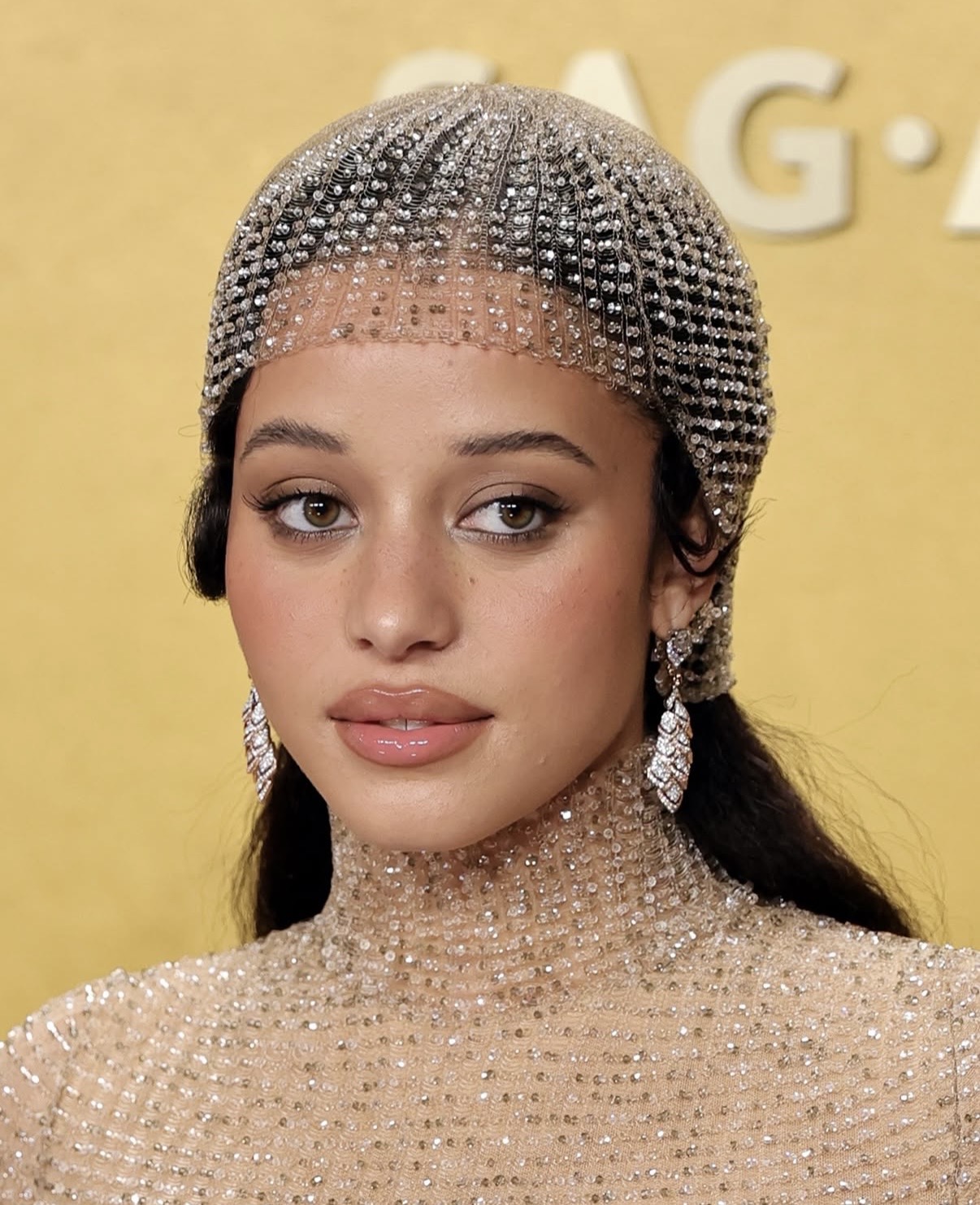 Chase Infiniti at the 2026 Actors Award wearing Jazz Age inspired makeup with warm pink blush and glossy neutral lips — 2026 Actors Award best beauty looks