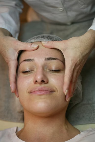 woman massaging her forehead