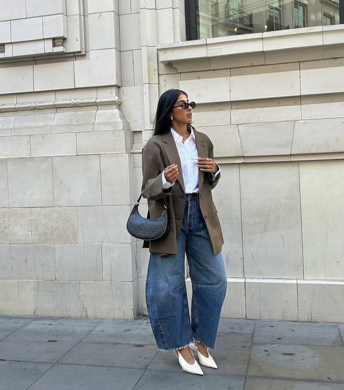 white heels with jeans and blazer in street style look - white heels styling