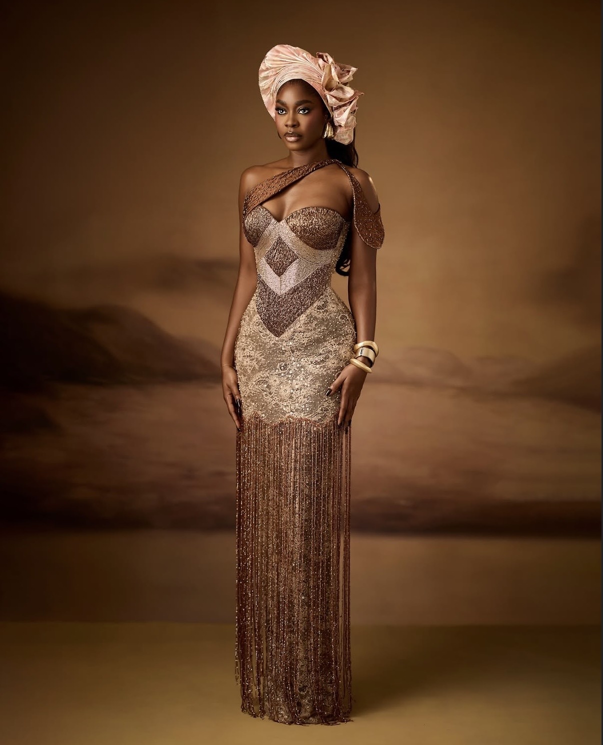 Dede Ashiogwu in Bronze Embellished Gown at Diiadem Amazing 35 Birthday, Highlighting Rich Lagos Fashion Style