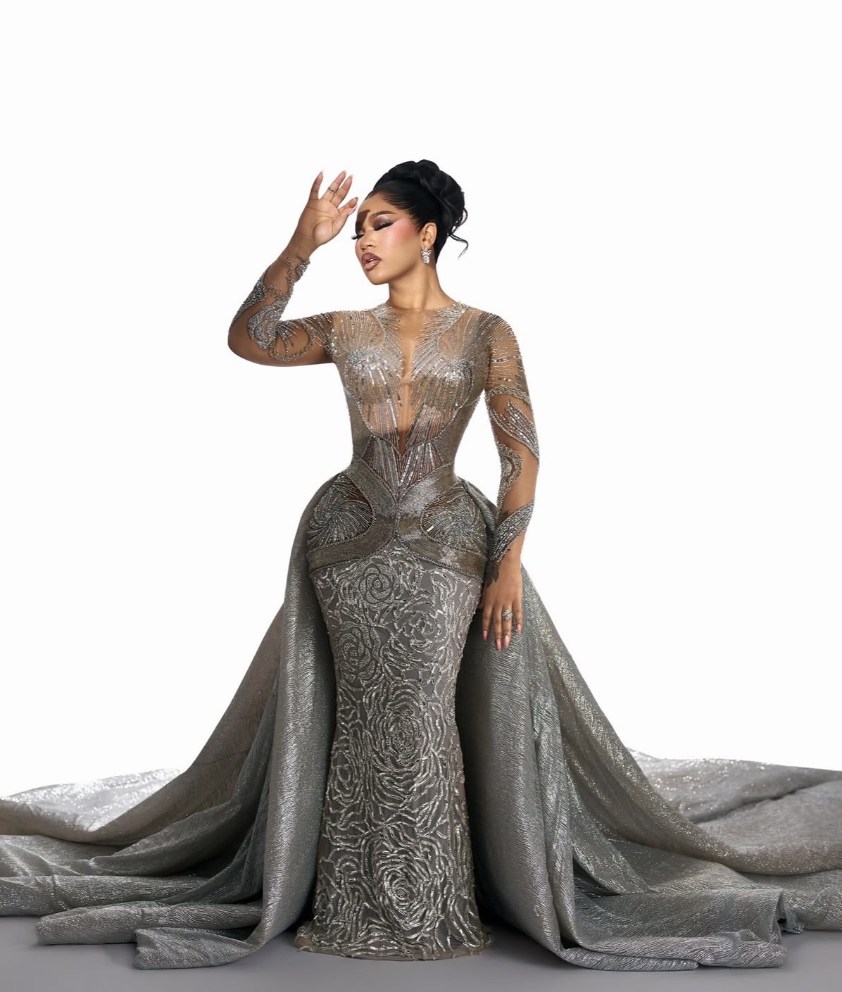 Adeola Adeyemi in silver dress at her Diiadem Amazing 35 birthday, wearing glamorous party fashion from Lagos